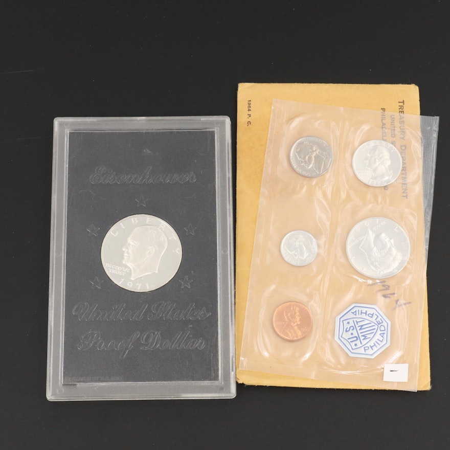 A Proof Eisenhower Silver Dollar and a 1964 U.S. Mint Proof Set