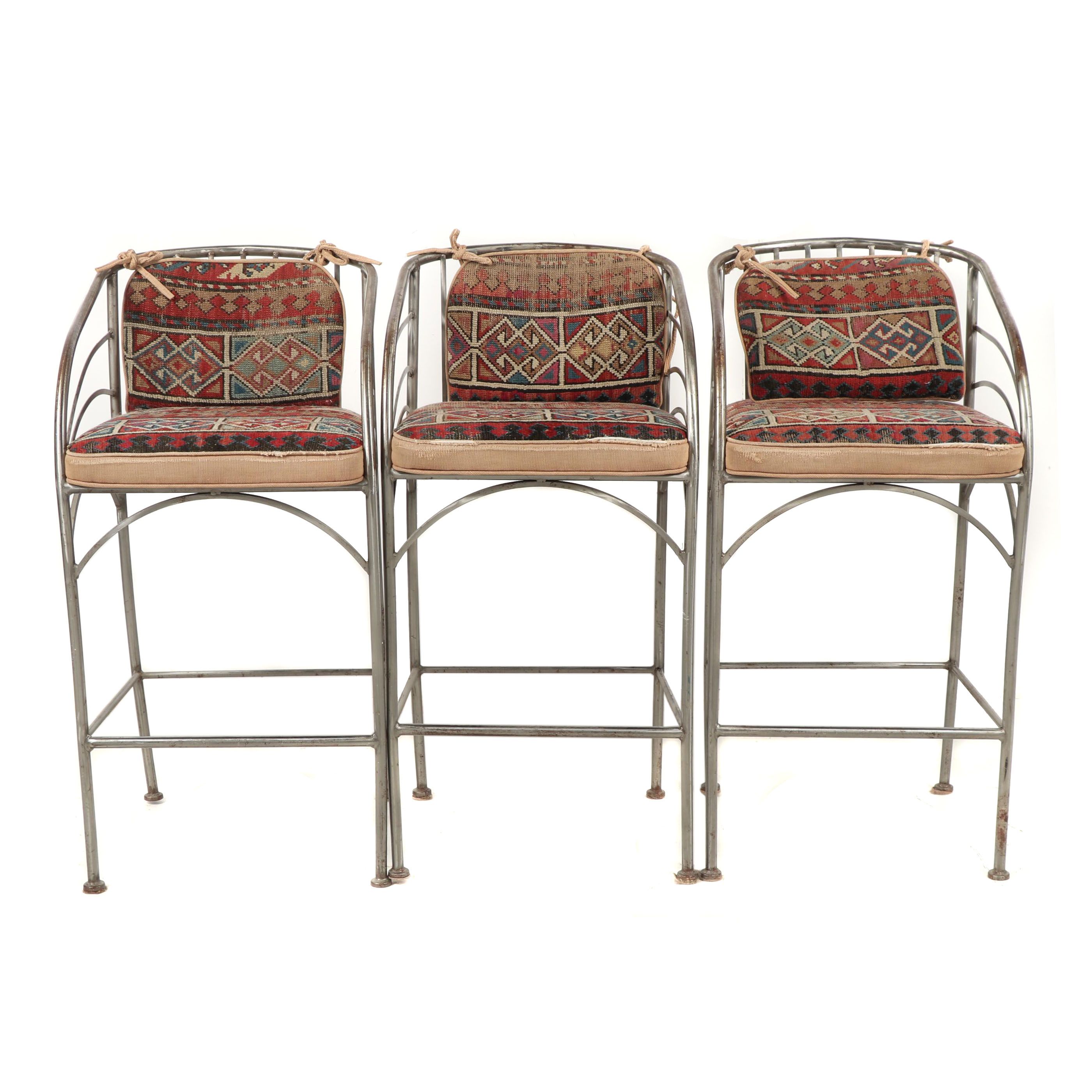 Three Wought Metal Barstools Upholstered with Fabric and Turkish Rugs