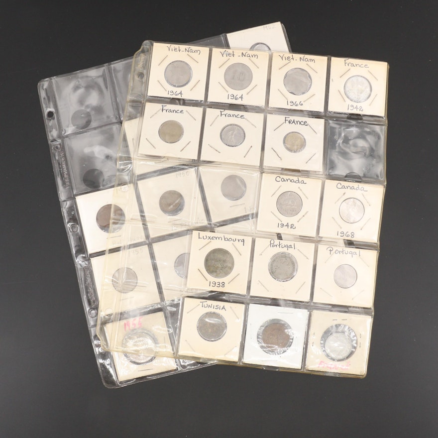 Two Album Pages of Twenty-Seven Vintage Foreign Coins