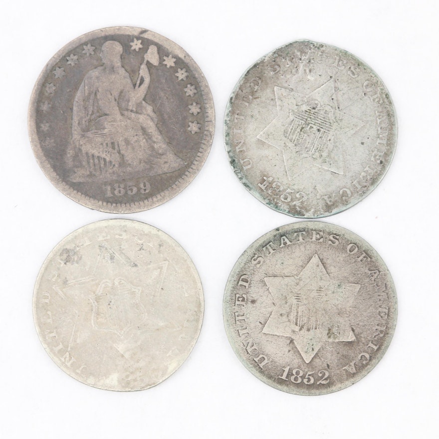 Three Silver 3-Cent "Trime" Coins and a Liberty Seated Silver Half Dime