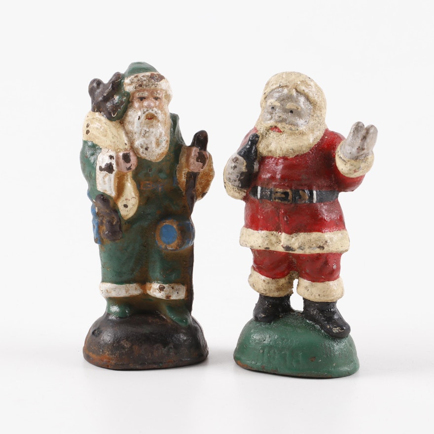 Hand-Painted Cast Iron Santa Claus and St. Nicholas Figurines, circa 1900