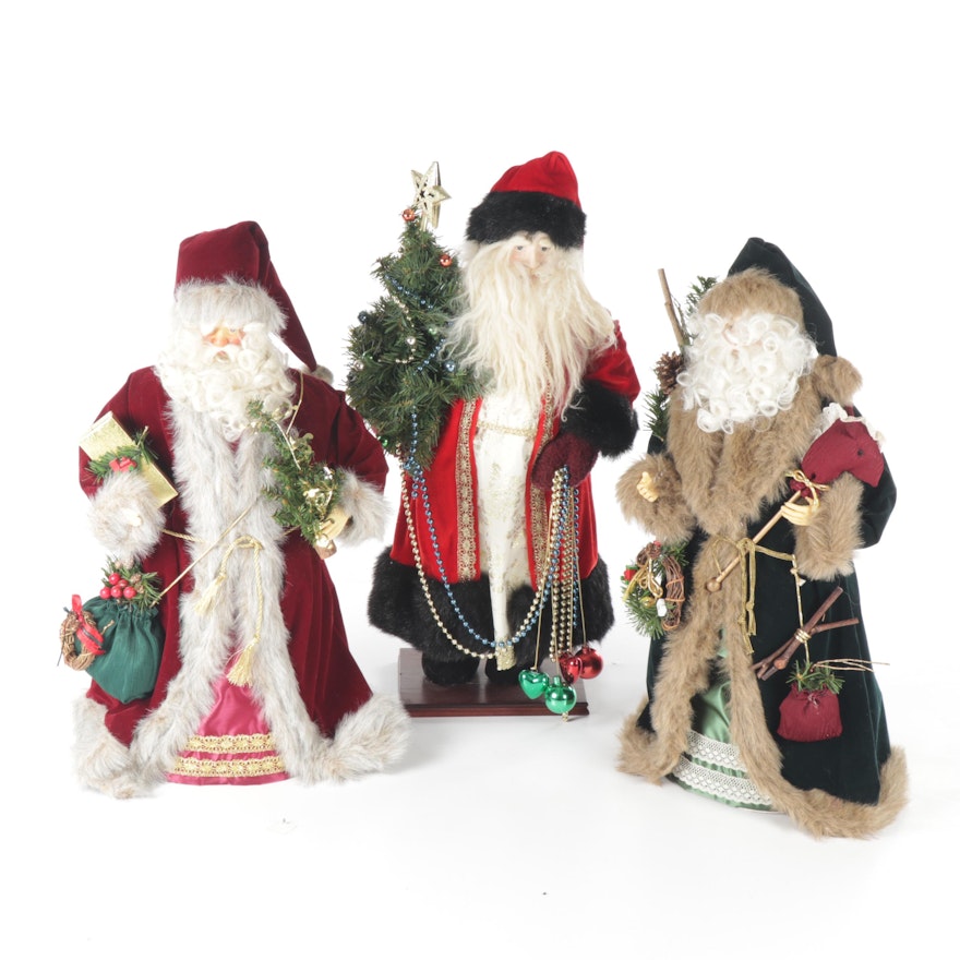 Trio of Decorative Santa Claus Figurines