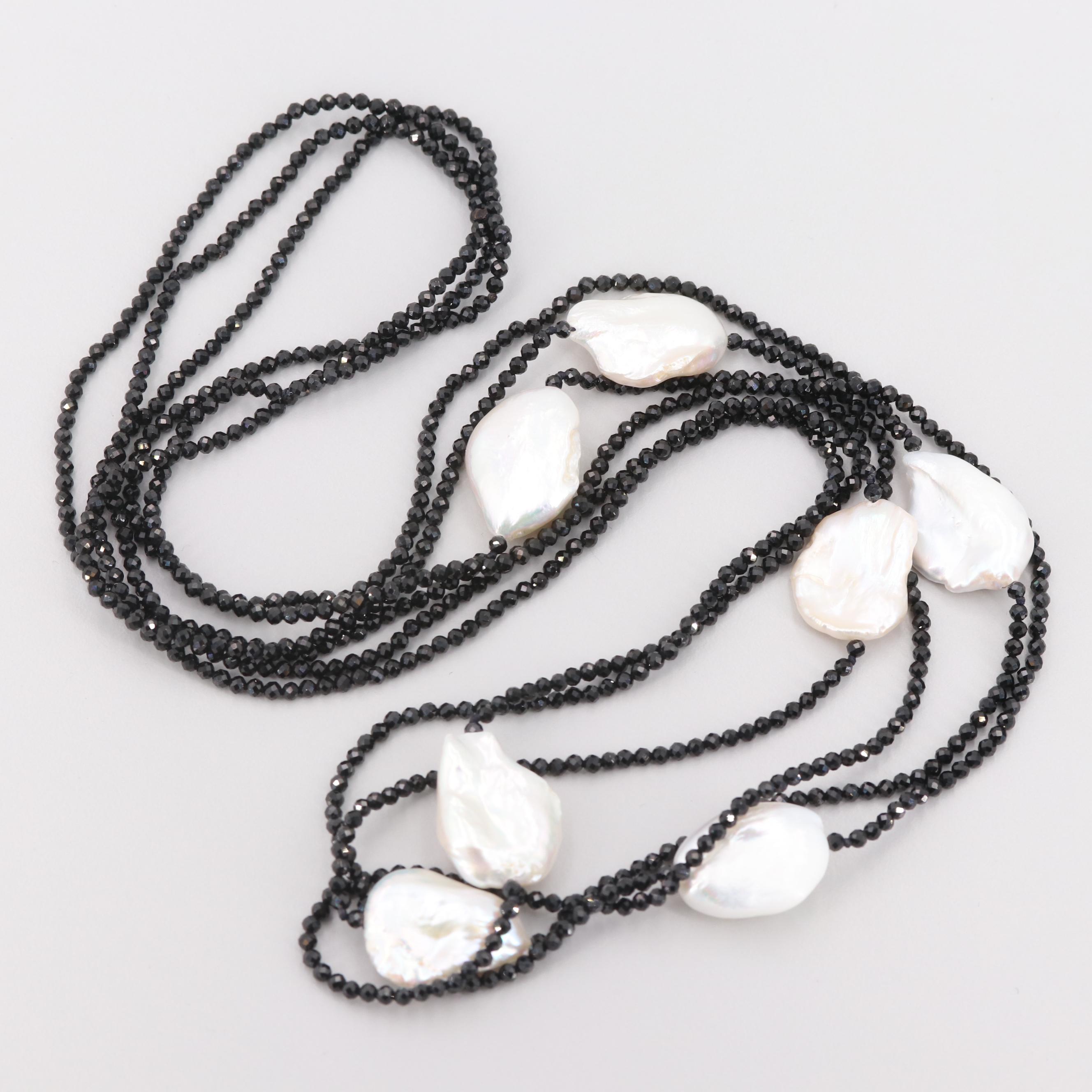 Cultured Pearl and Synthetic Black Spinel Triple-Stranded Necklace
