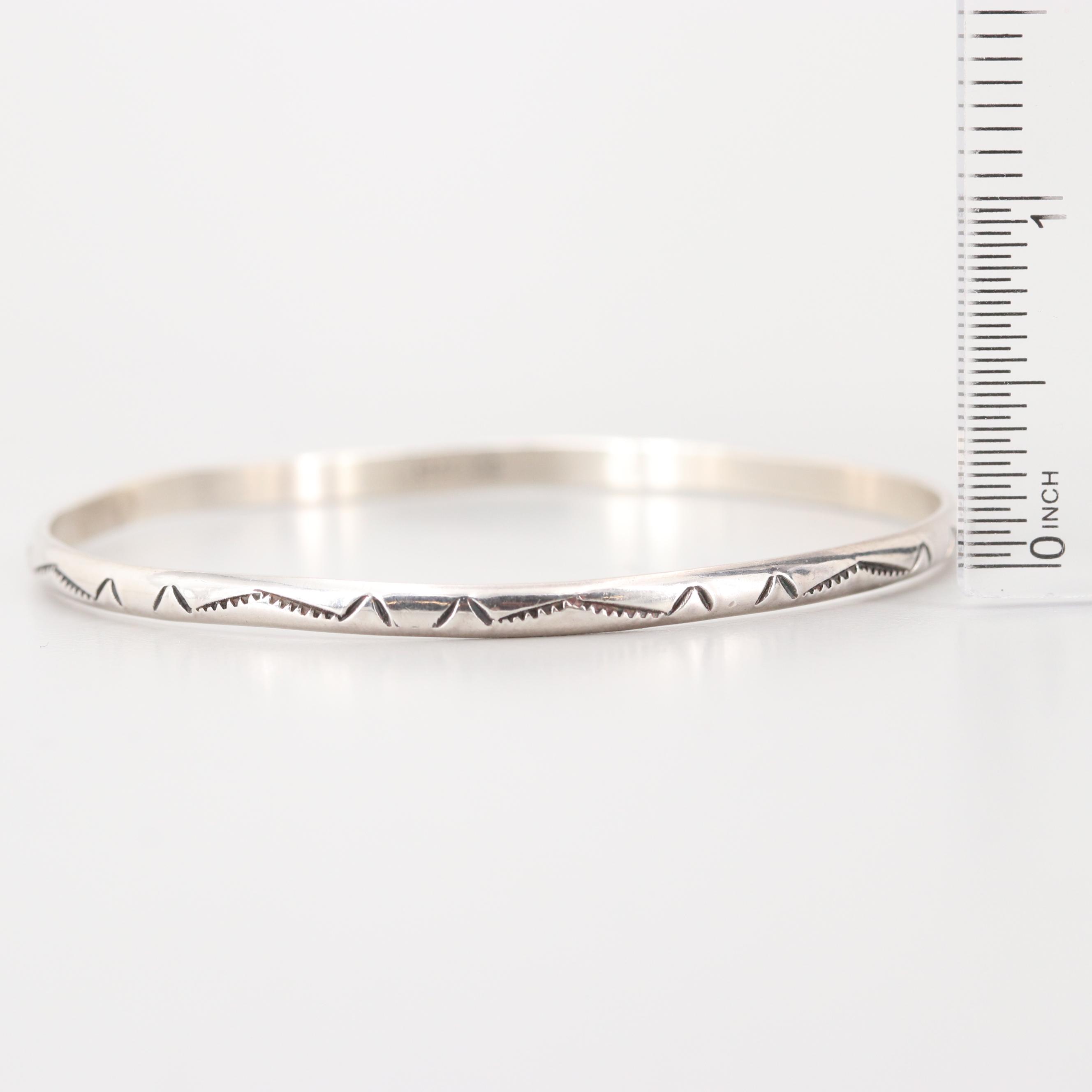 Collection of Sterling Silver Engraved and Interlocking Bangle Bracelets