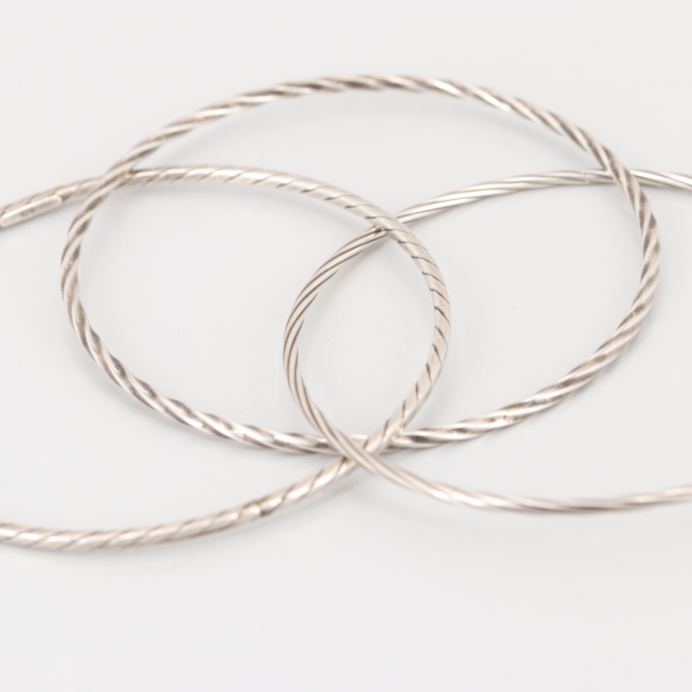 Collection of Sterling Silver Engraved and Interlocking Bangle Bracelets