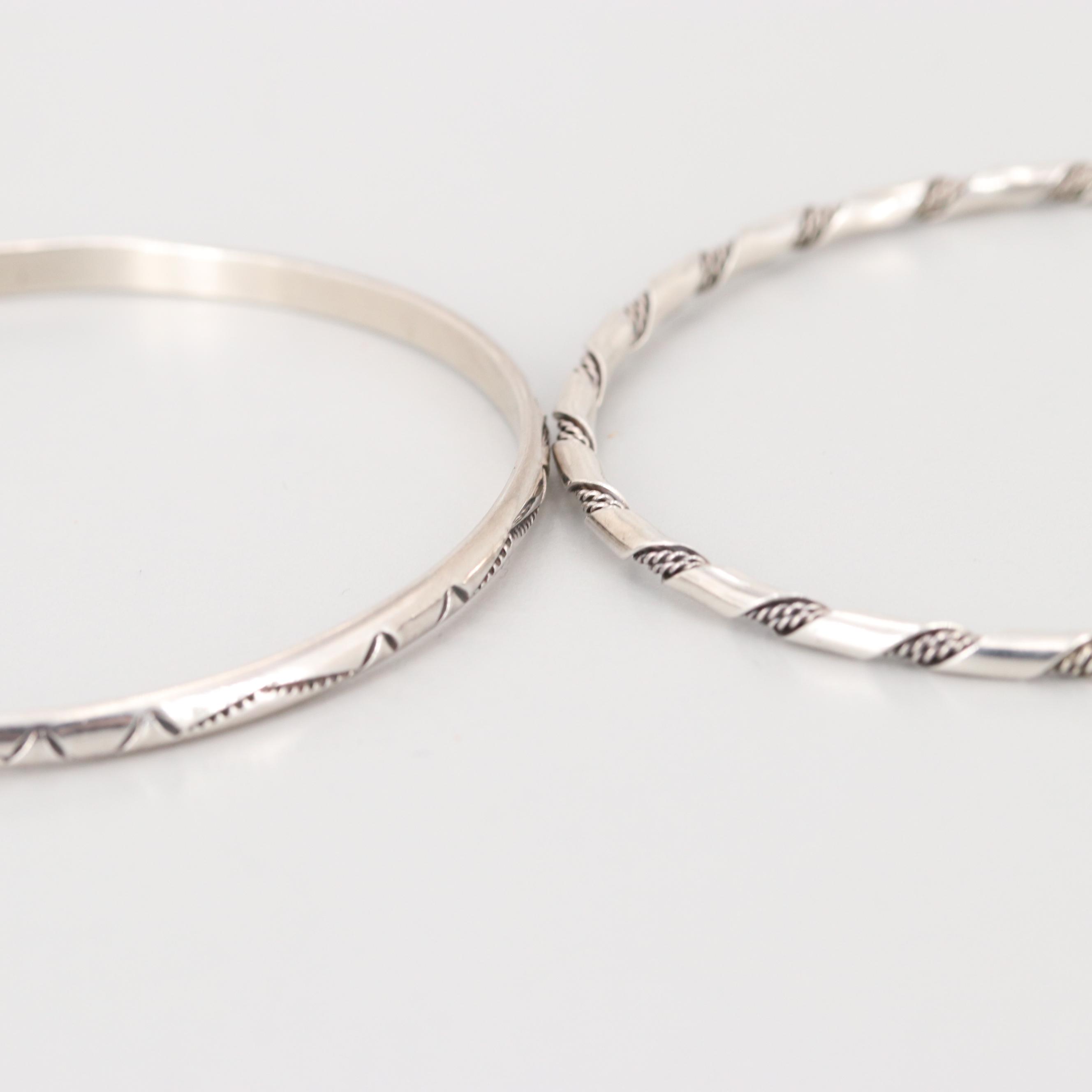 Collection of Sterling Silver Engraved and Interlocking Bangle Bracelets