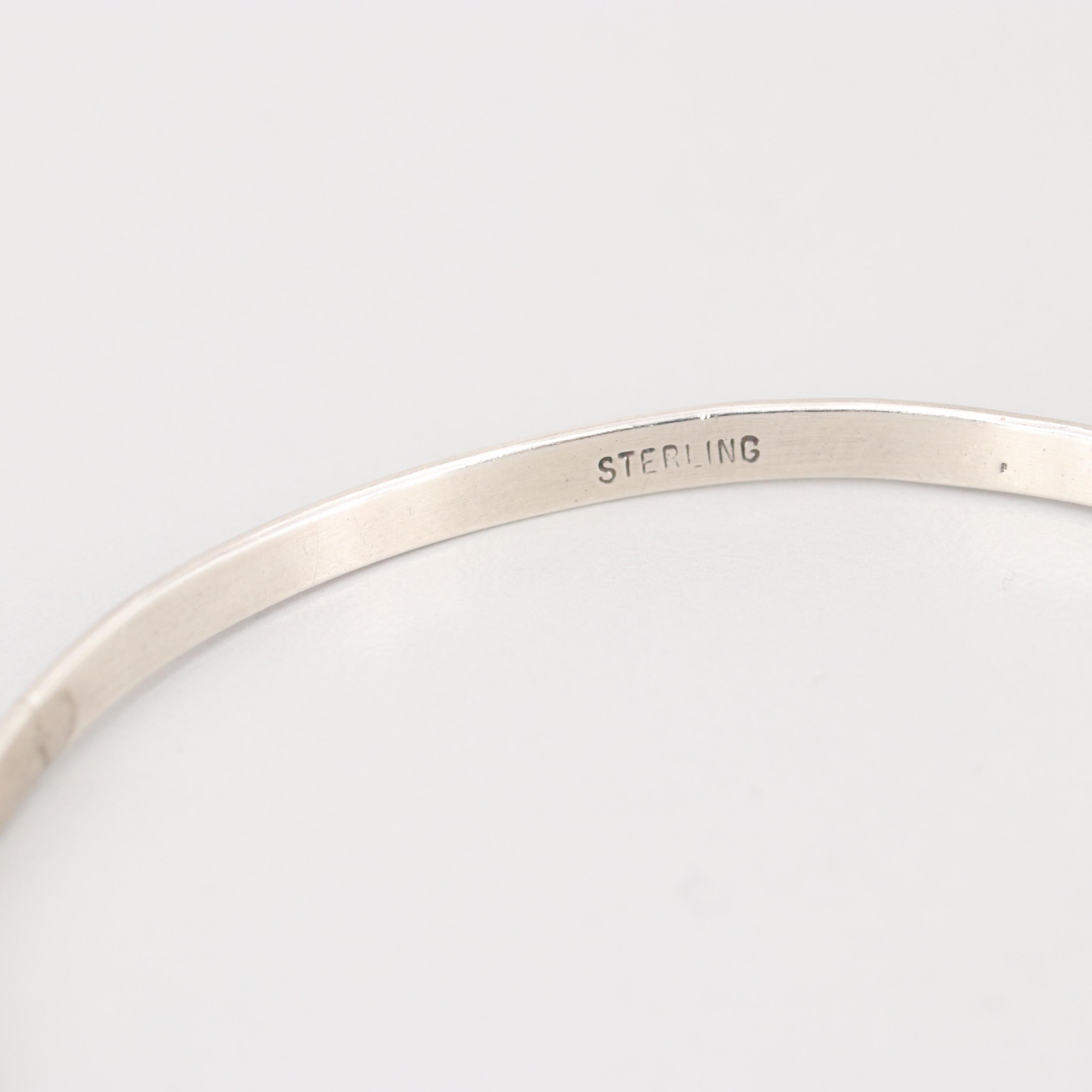 Collection of Sterling Silver Engraved and Interlocking Bangle Bracelets