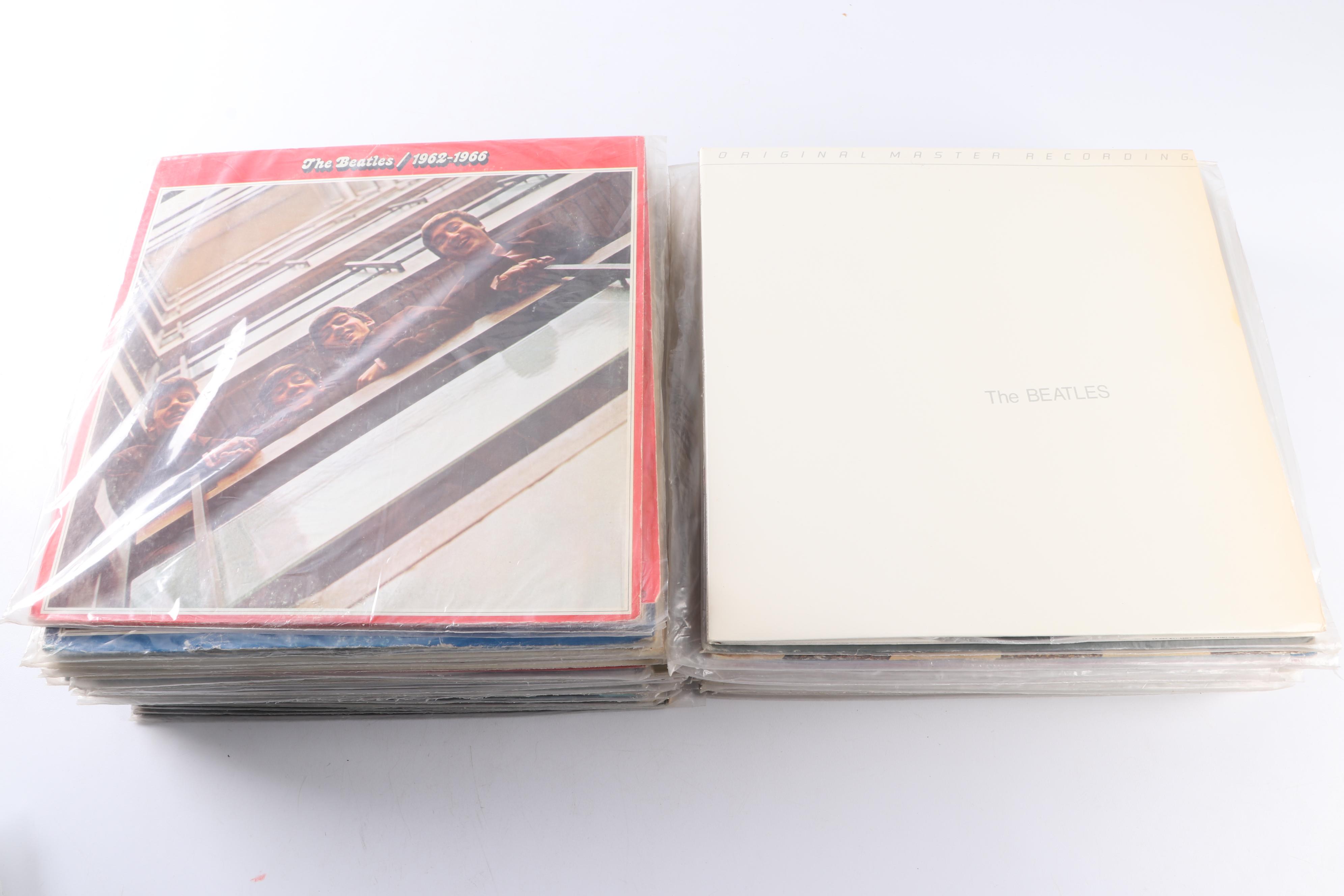 The Beatles Records Including 45s, Original Master Recording and Colored Vinyl