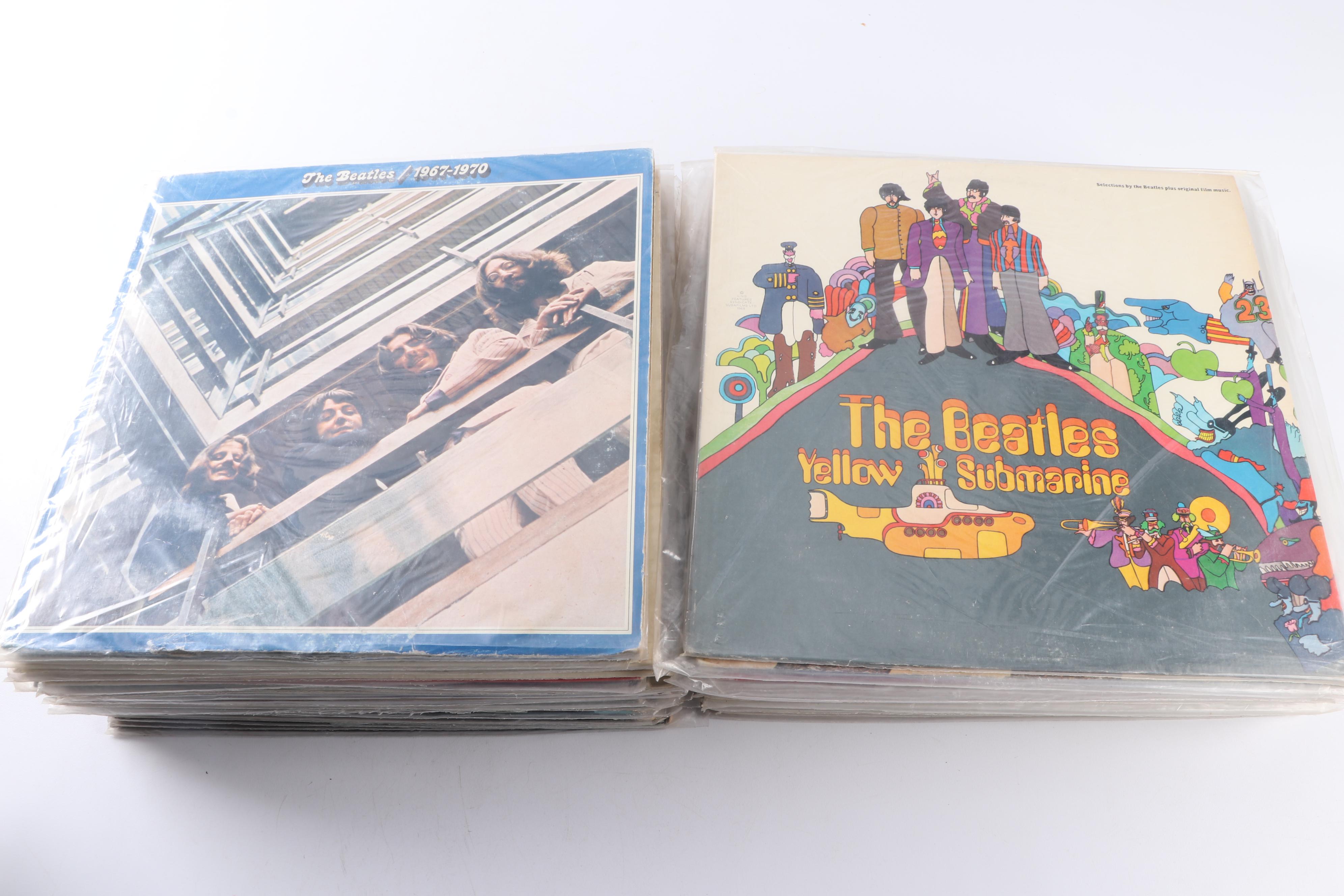 The Beatles Records Including 45s, Original Master Recording and Colored Vinyl