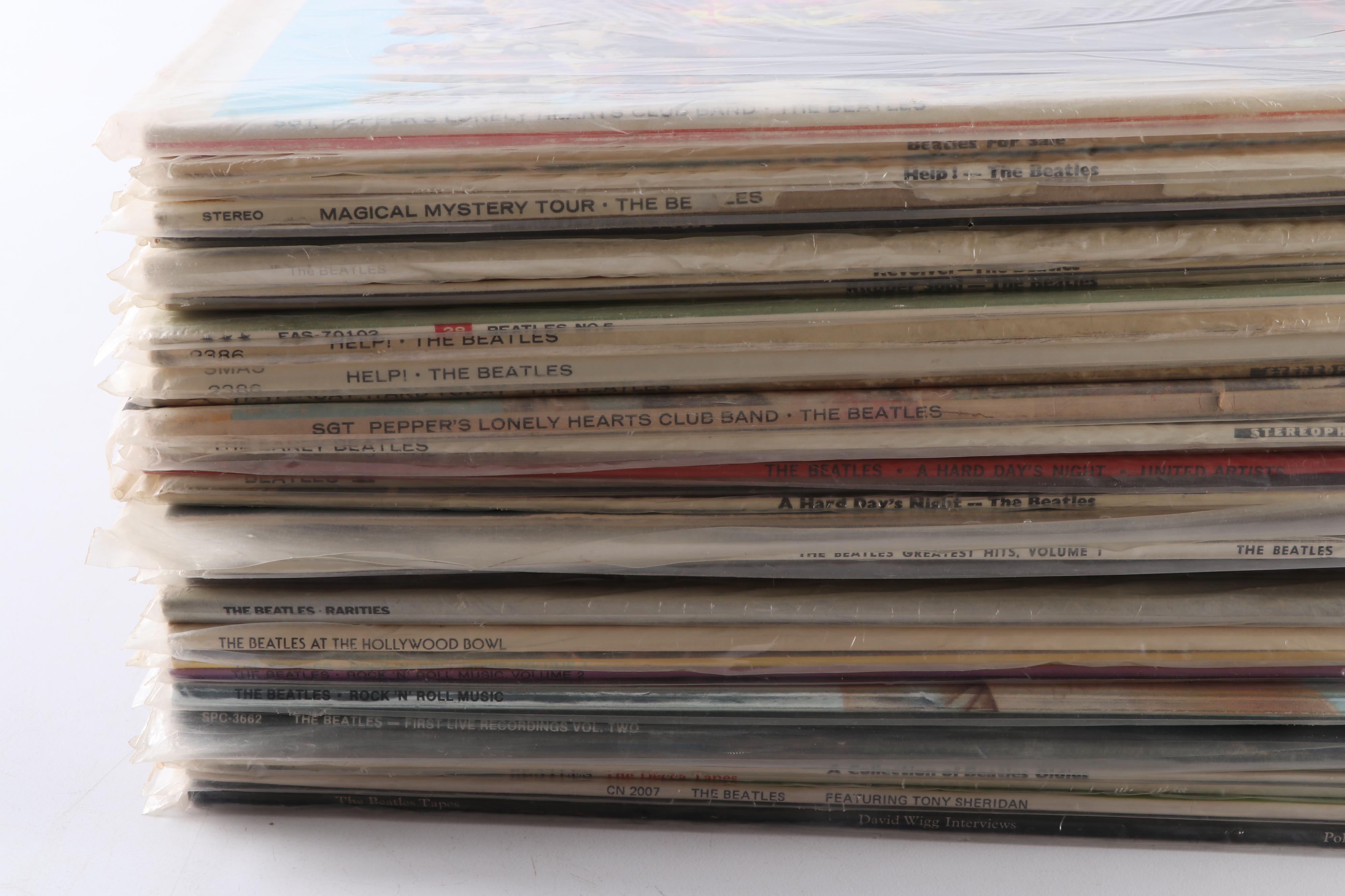 The Beatles Records Including 45s, Original Master Recording and Colored Vinyl