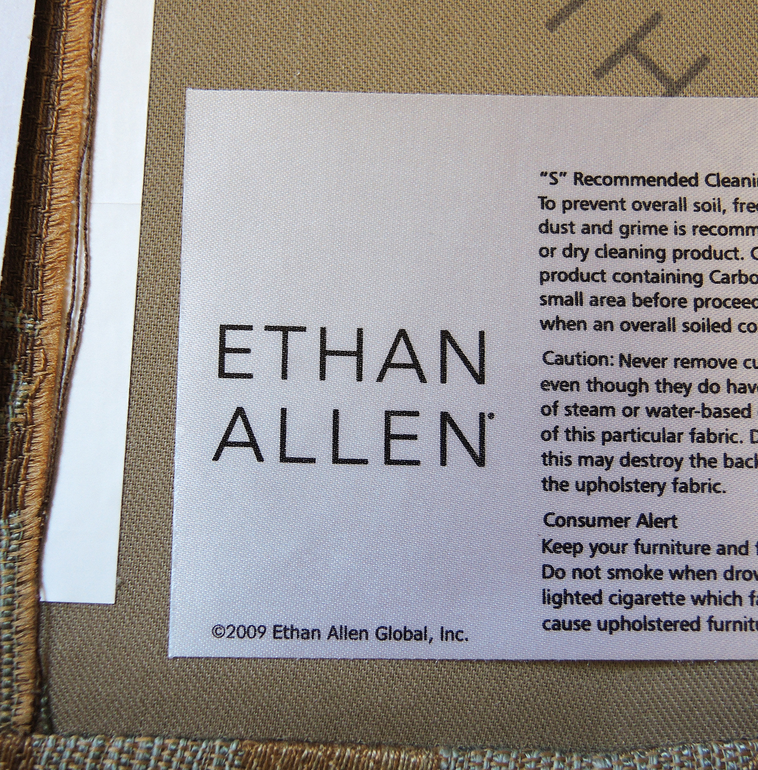 Ethan Allen Upholstered Arm Chair and Ottoman