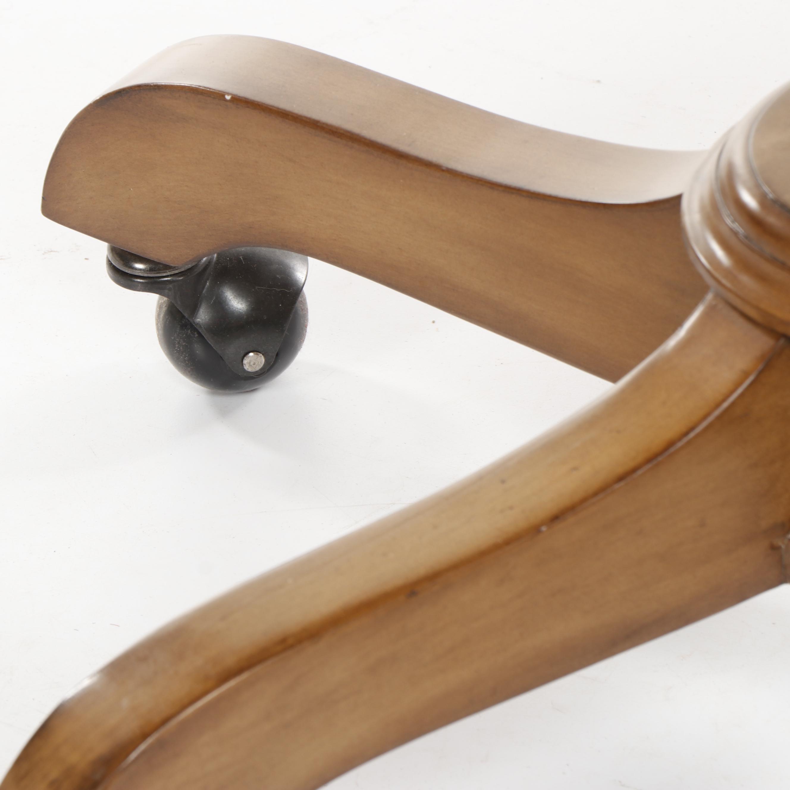 Contemporary Pottery Barn "Wingate" Rattan Swivel Chair in Pecan