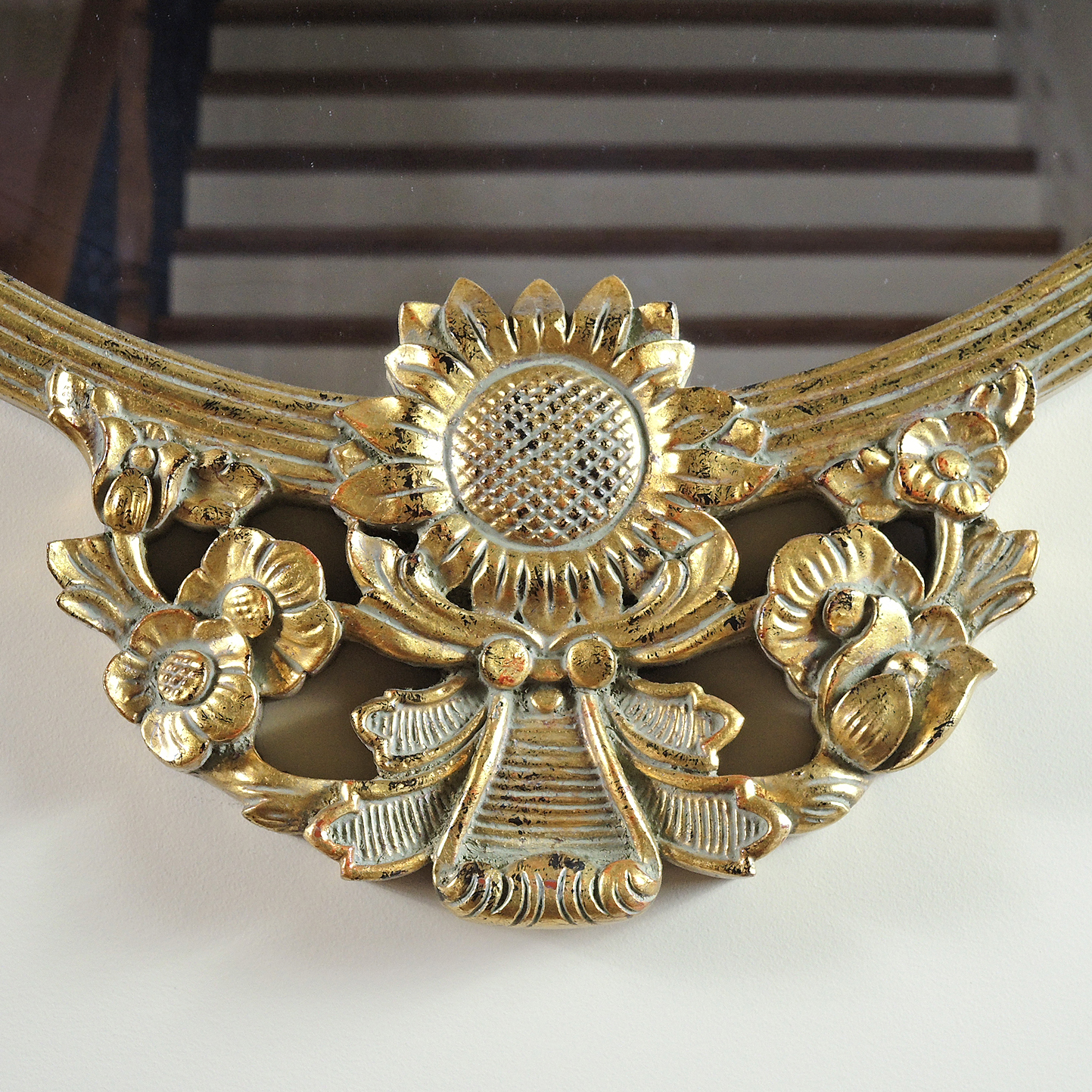 Round Wall Mirror with Floral Accents in Gold Tone Finish