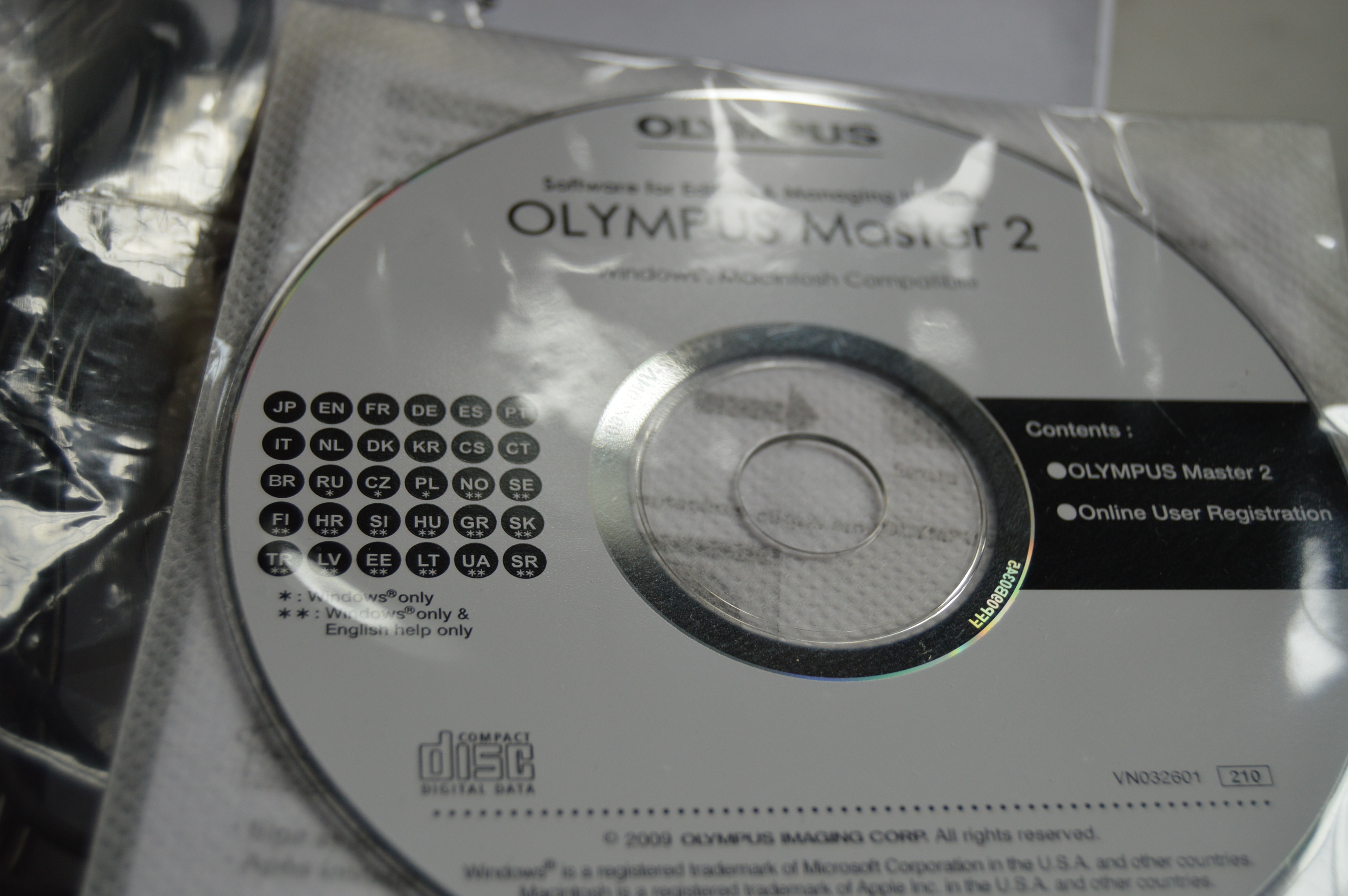 Vintage GE Sportmate Portable Radio+Olympus Stylus Tough 12 MP Digital Camera