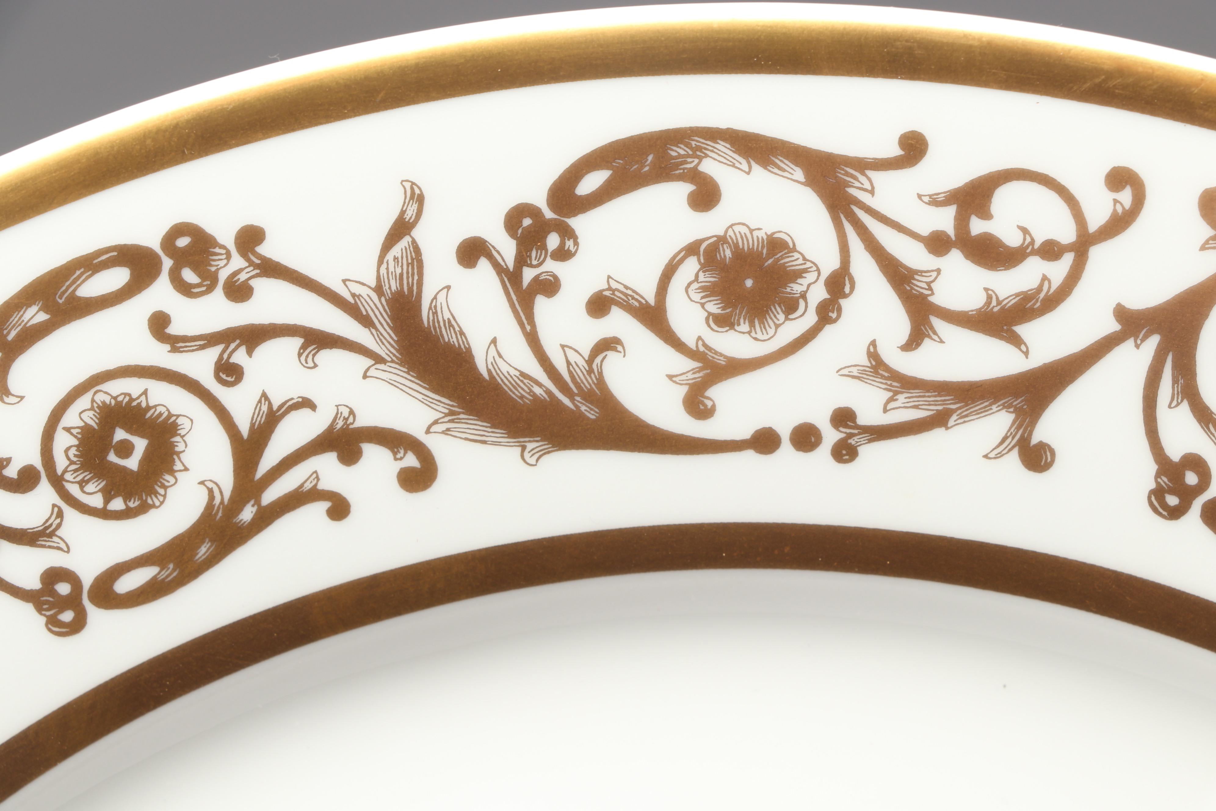 Fabergé Limoges Porcelain Gilt Plates Including the "Imperial Coronation Egg"