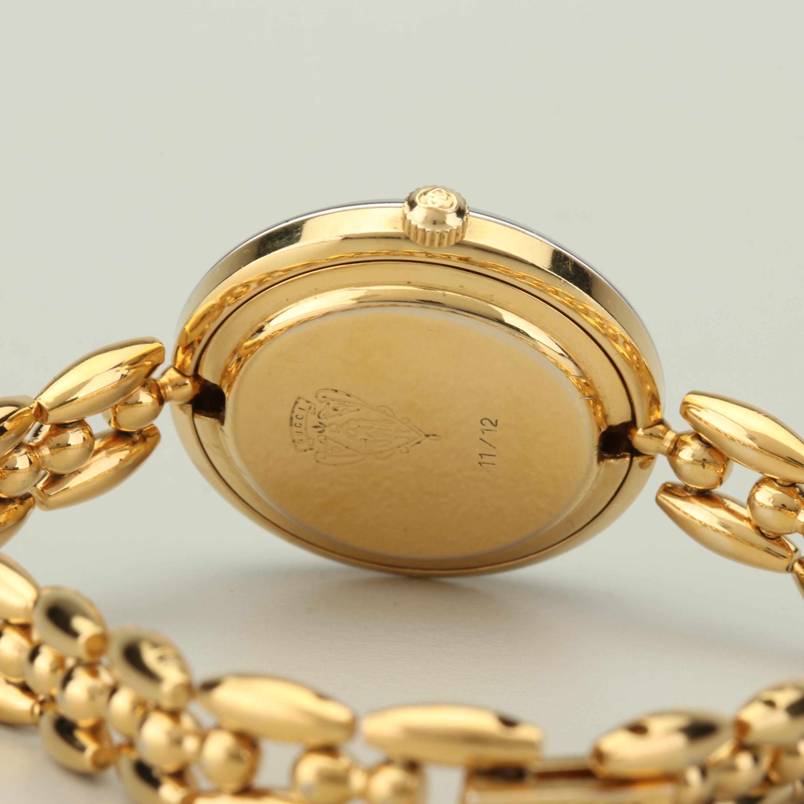 Gucci Gold Tone Watch with Interchangeable Bezels