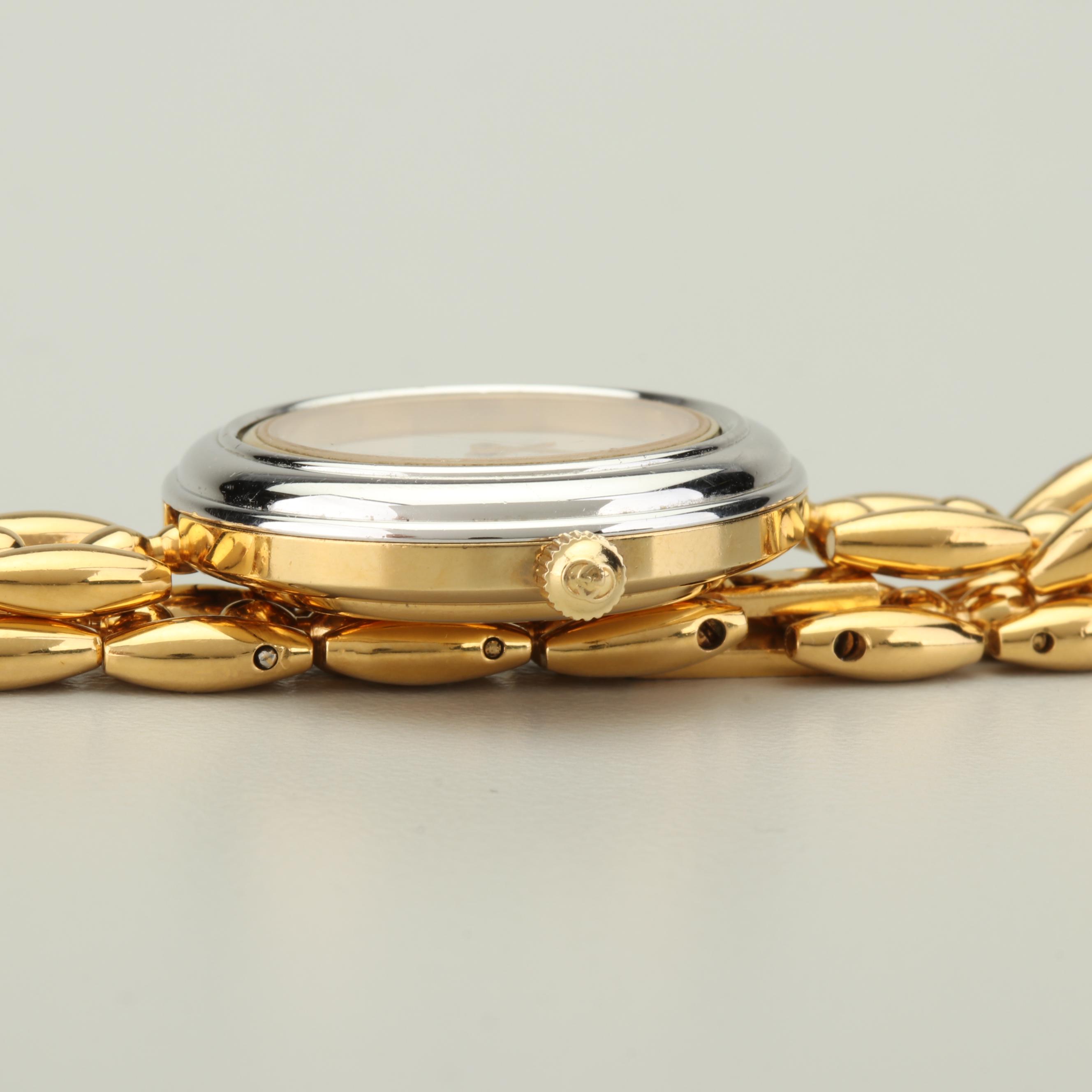 Gucci Gold Tone Watch with Interchangeable Bezels