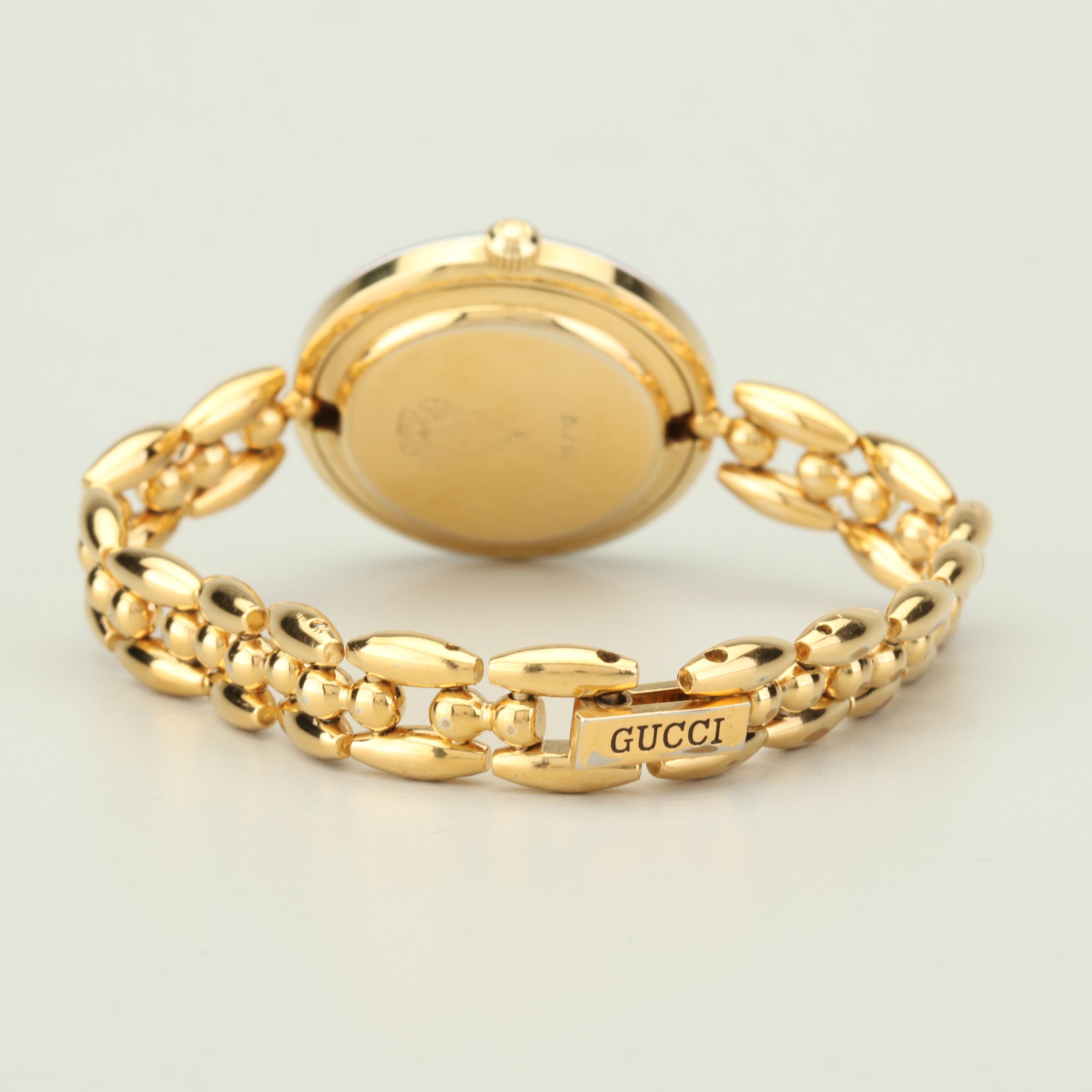 Gucci Gold Tone Watch with Interchangeable Bezels