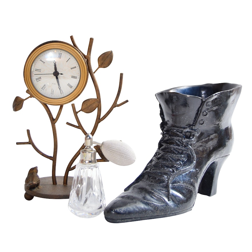 Collectibles with Clock, Boot and Perfume Bottle