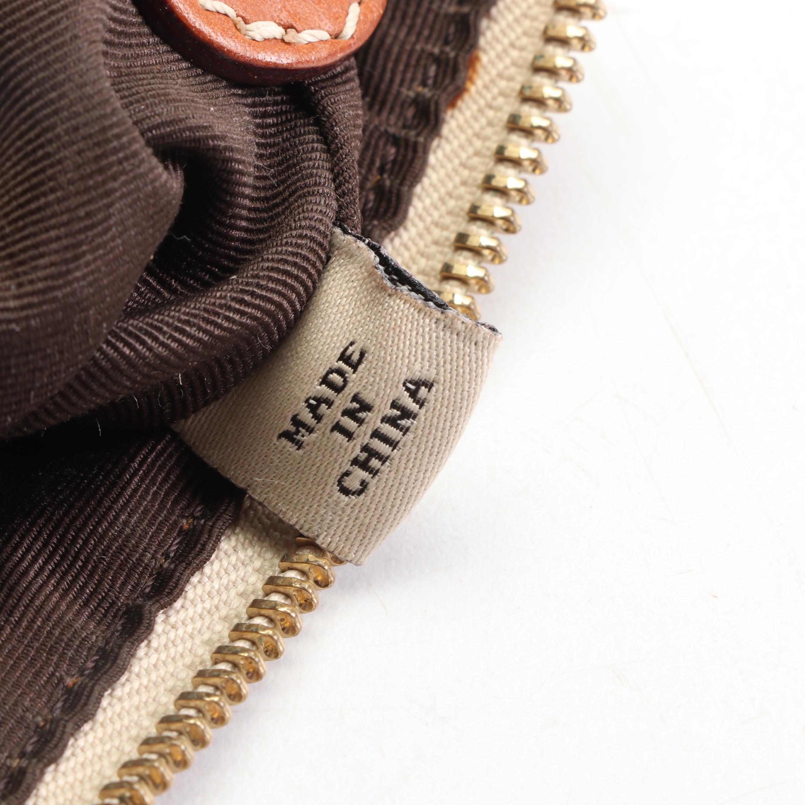 Kate Spade New York Pia Dot Tan Canvas and Leather Baguette Bag