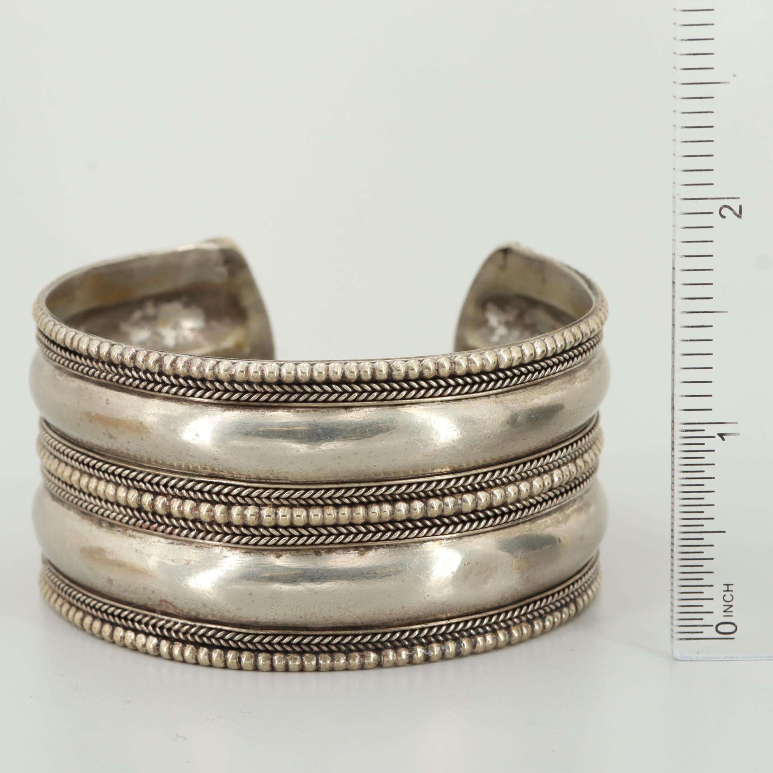 Silver Tone, Resin, and Copper Bracelets Featuring Cuff and Bangle Styles