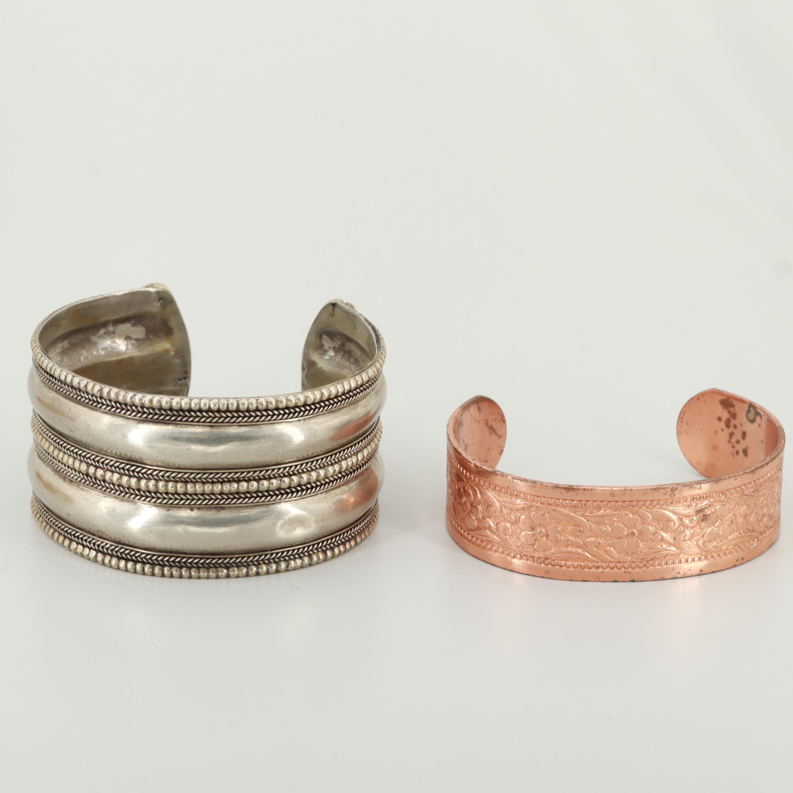 Silver Tone, Resin, and Copper Bracelets Featuring Cuff and Bangle Styles