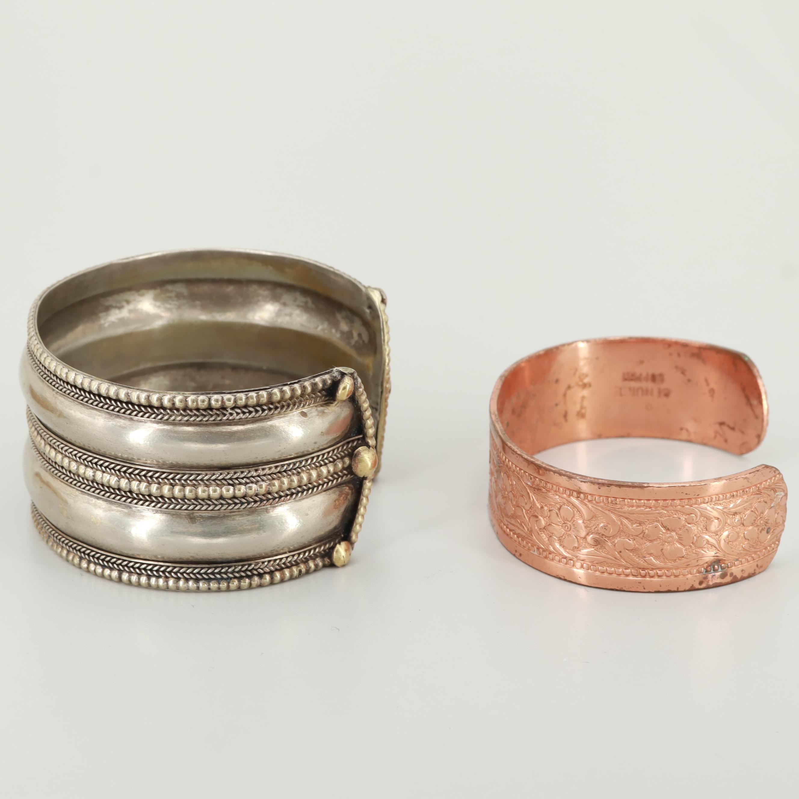 Silver Tone, Resin, and Copper Bracelets Featuring Cuff and Bangle Styles