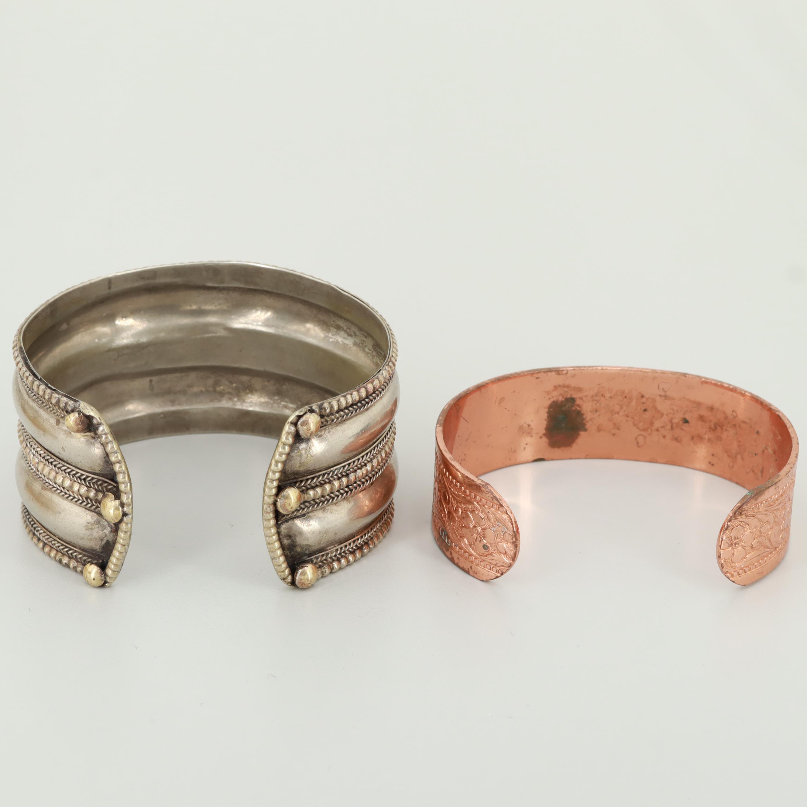 Silver Tone, Resin, and Copper Bracelets Featuring Cuff and Bangle Styles