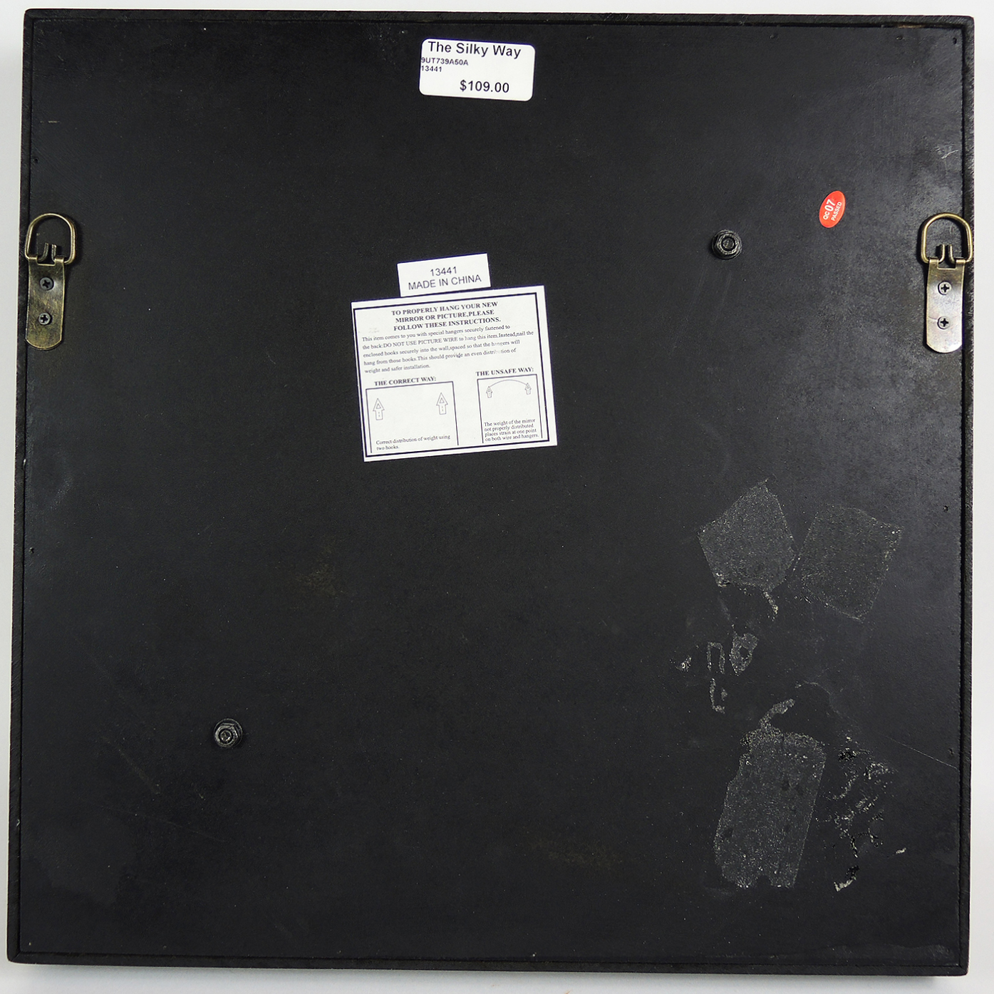 Table Decor Including an Armillary Sphere and Candlestick Lamp