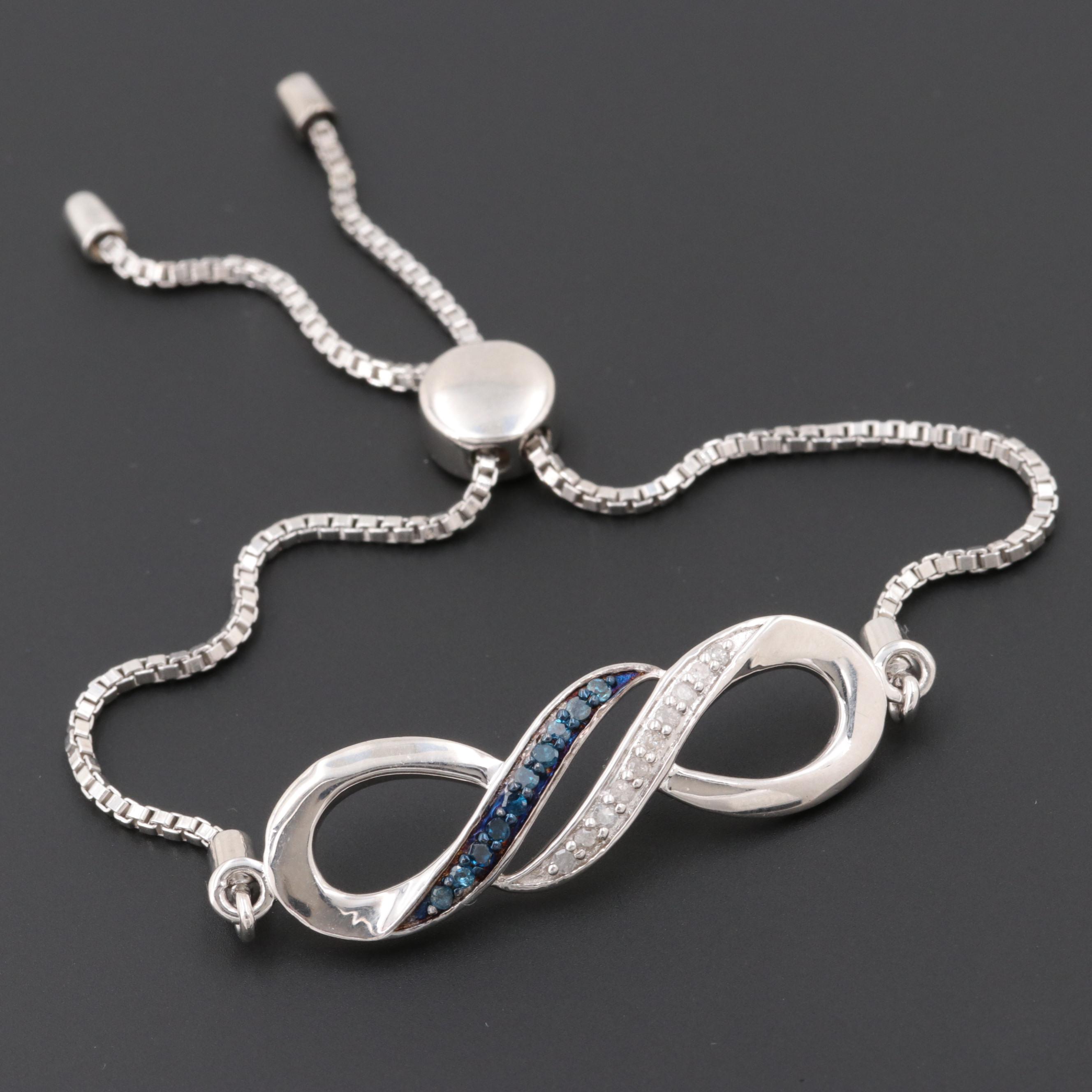 Sterling Silver Diamond and Blue Diamond Bracelet