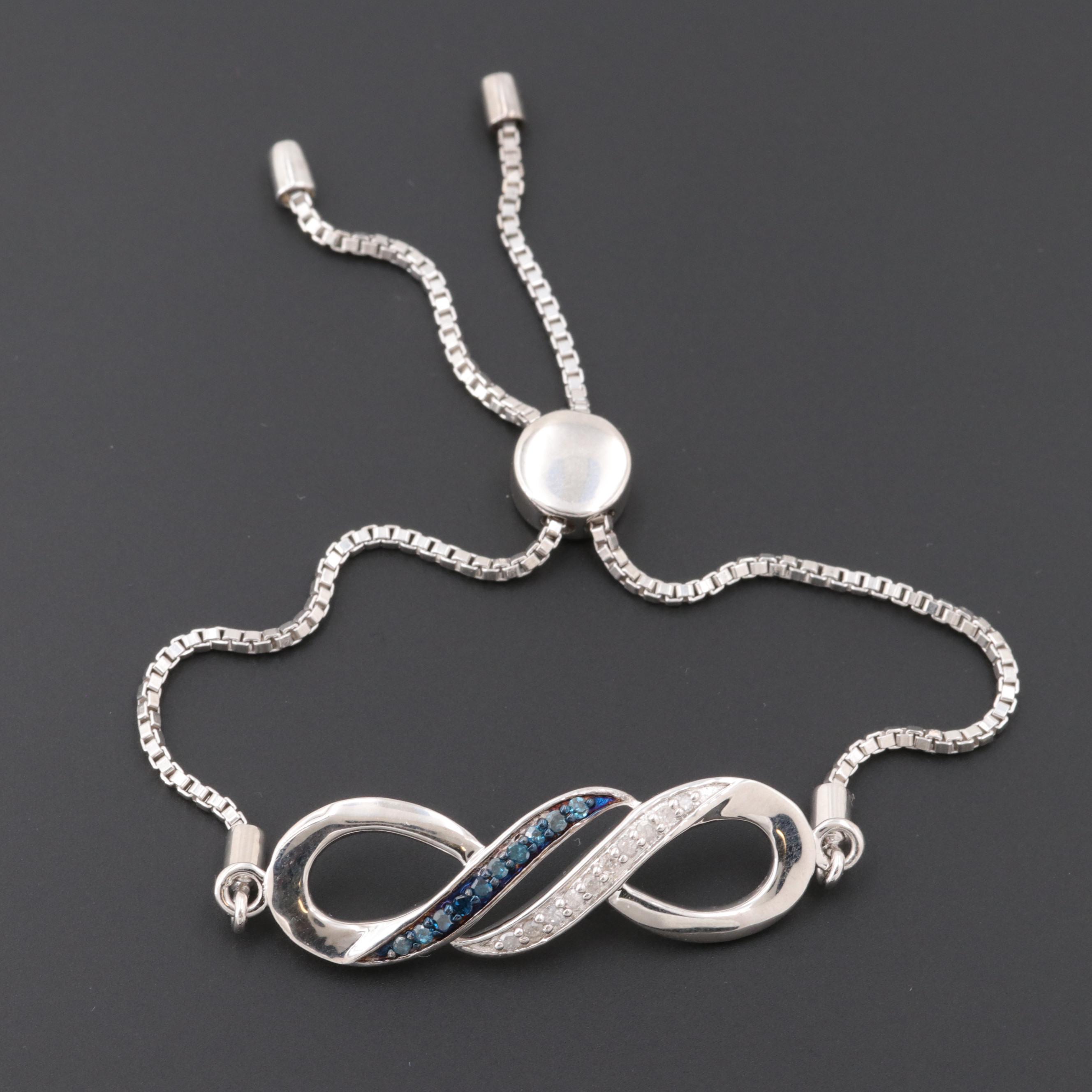 Sterling Silver Diamond and Blue Diamond Bracelet