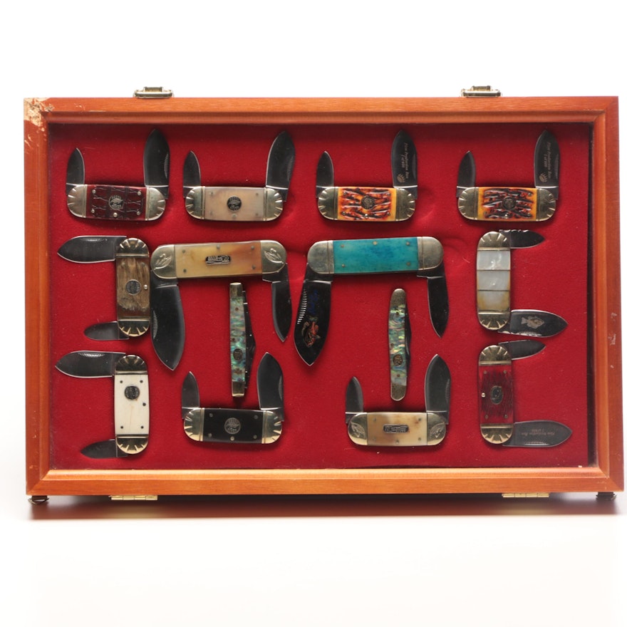 Collection of Vintage Folding Knives in Display Case
