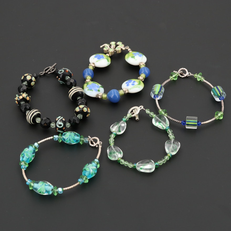 Collection of Sterling Silver and Silver Tone Multi Colored Glass Bead Bracelets