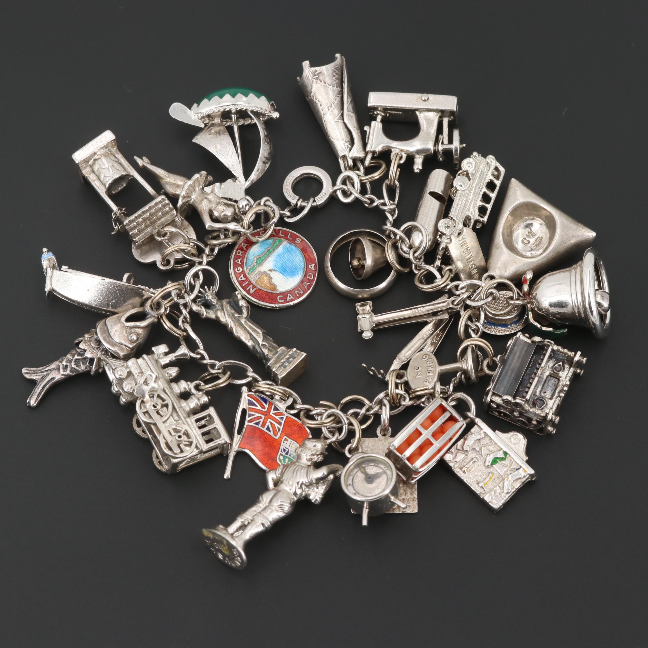 Sterling Silver and Silver Tone Charm Bracelet with Articulated Charms