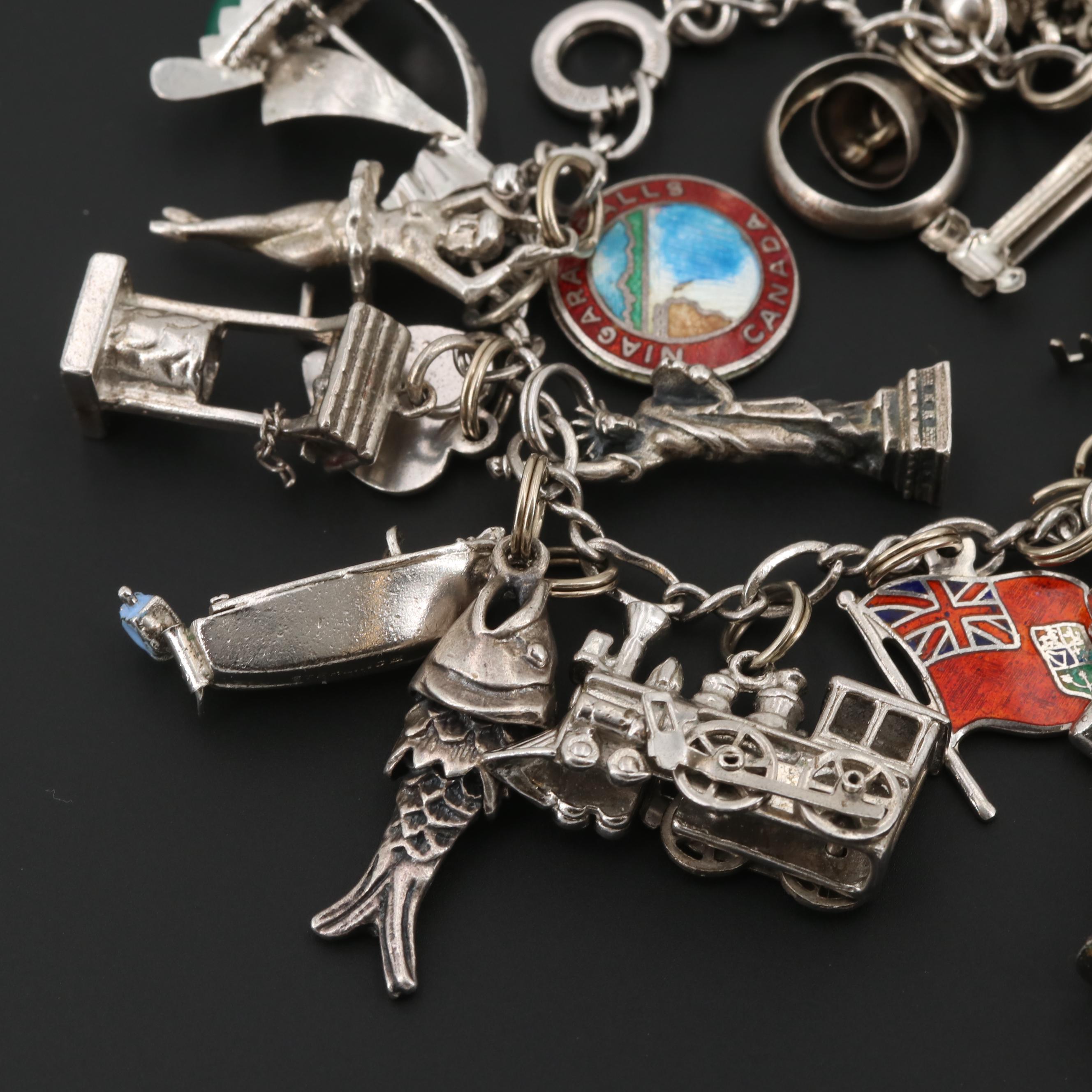 Sterling Silver and Silver Tone Charm Bracelet with Articulated Charms