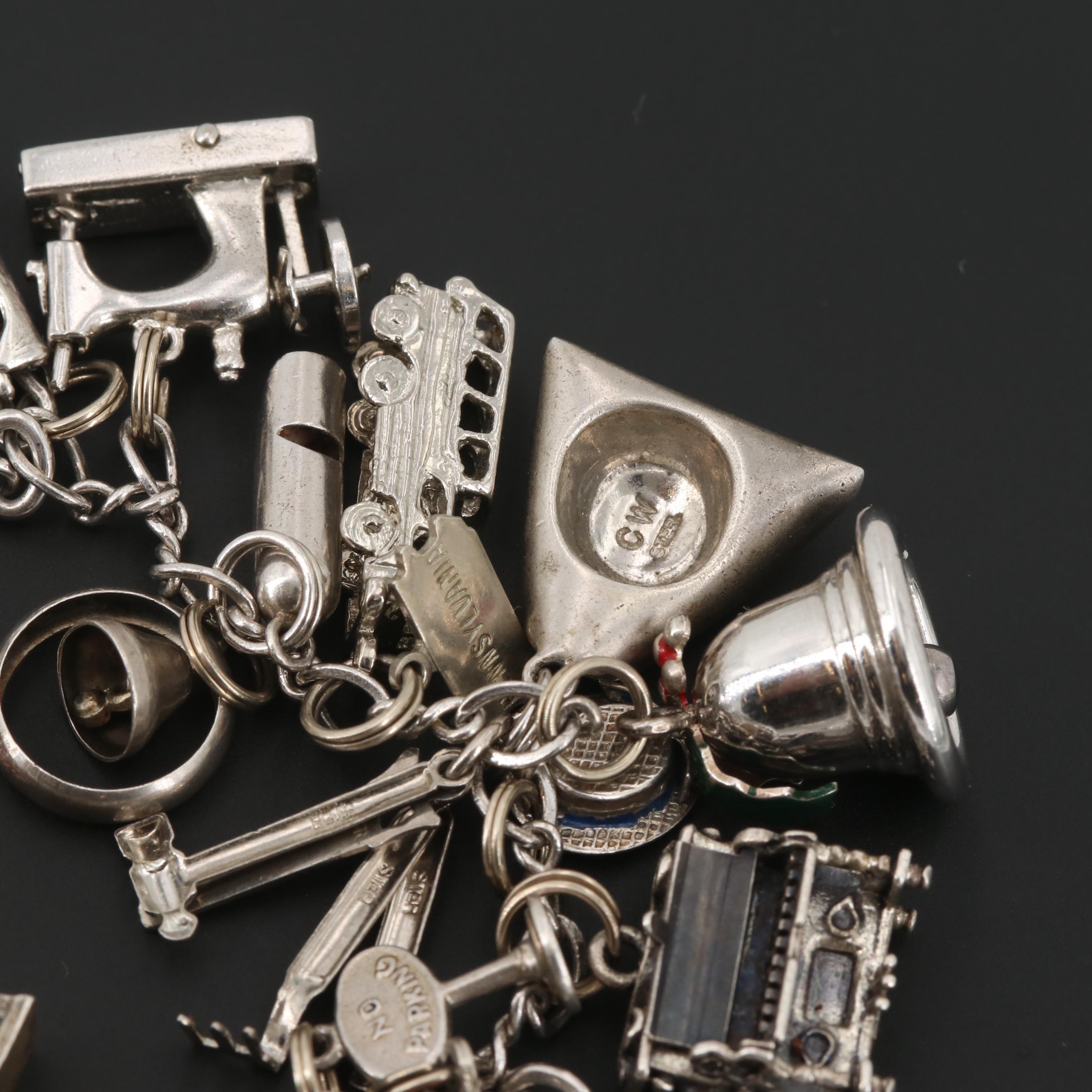 Sterling Silver and Silver Tone Charm Bracelet with Articulated Charms