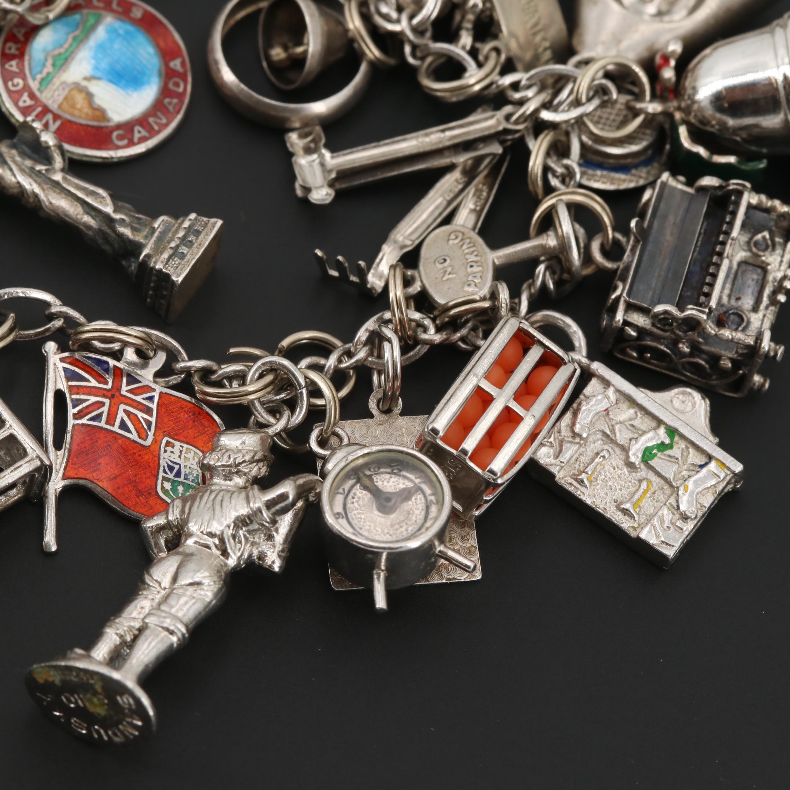 Sterling Silver and Silver Tone Charm Bracelet with Articulated Charms