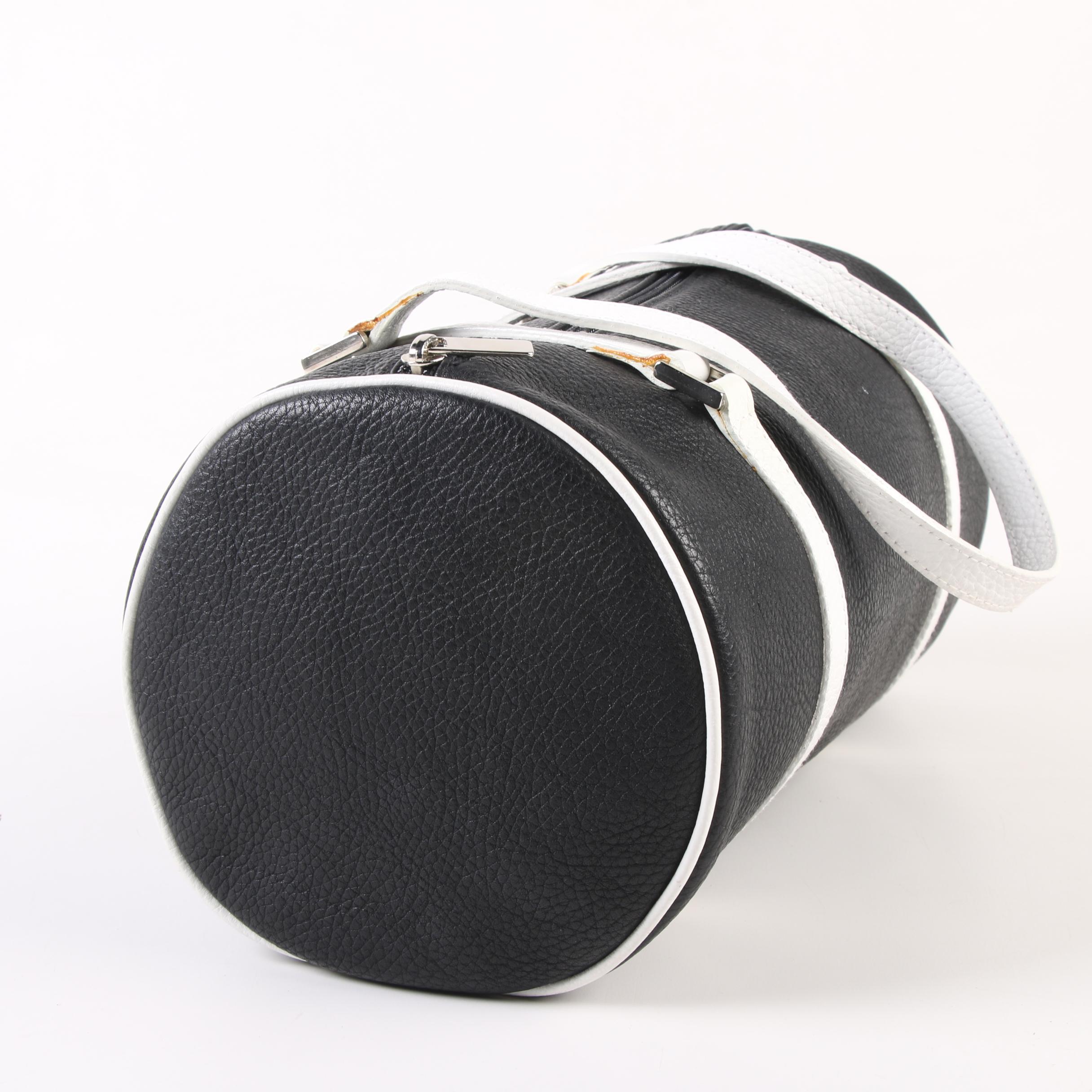 Tanner Barrel Bag in Black Pebbled Leather with White Leather Straps