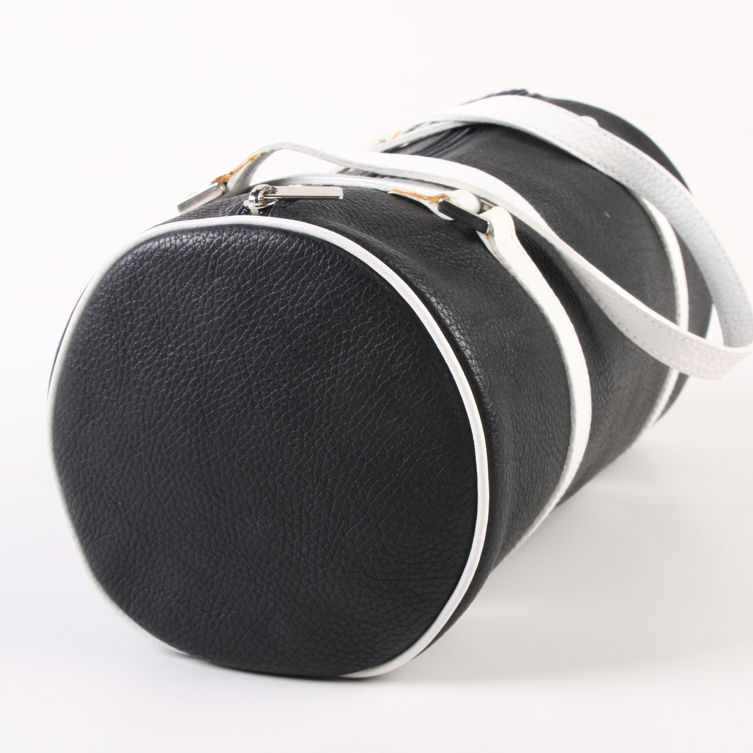 Tanner Barrel Bag in Black Pebbled Leather with White Leather Straps