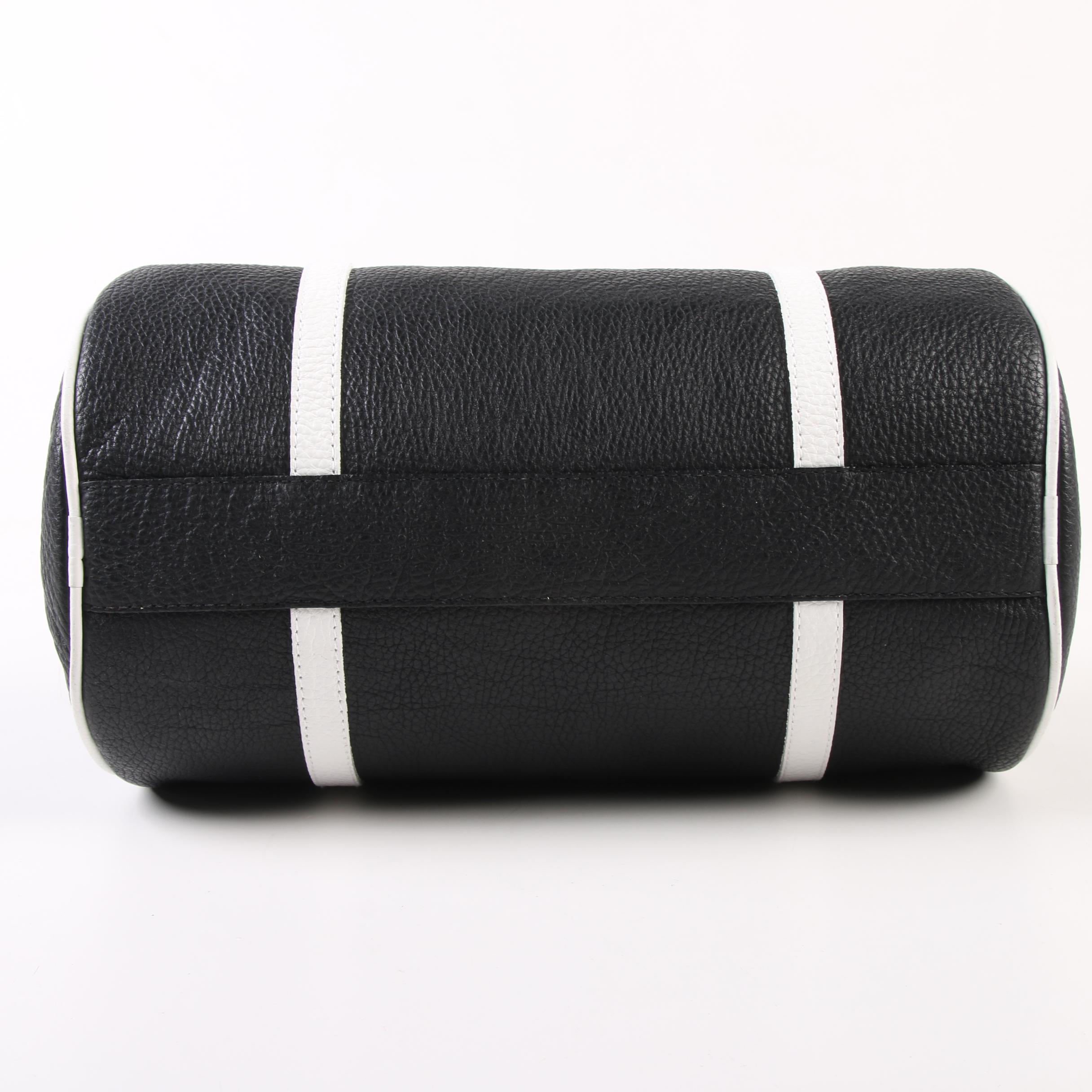 Tanner Barrel Bag in Black Pebbled Leather with White Leather Straps