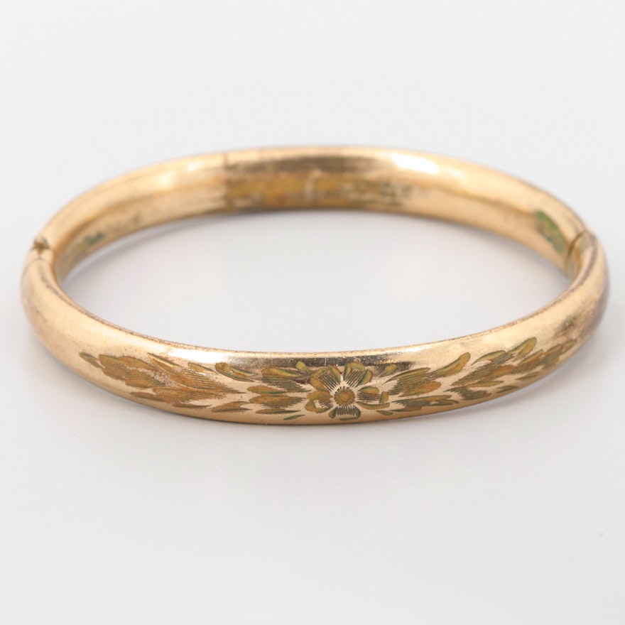 Gold Tone Bangle Bracelet with Floral Motif