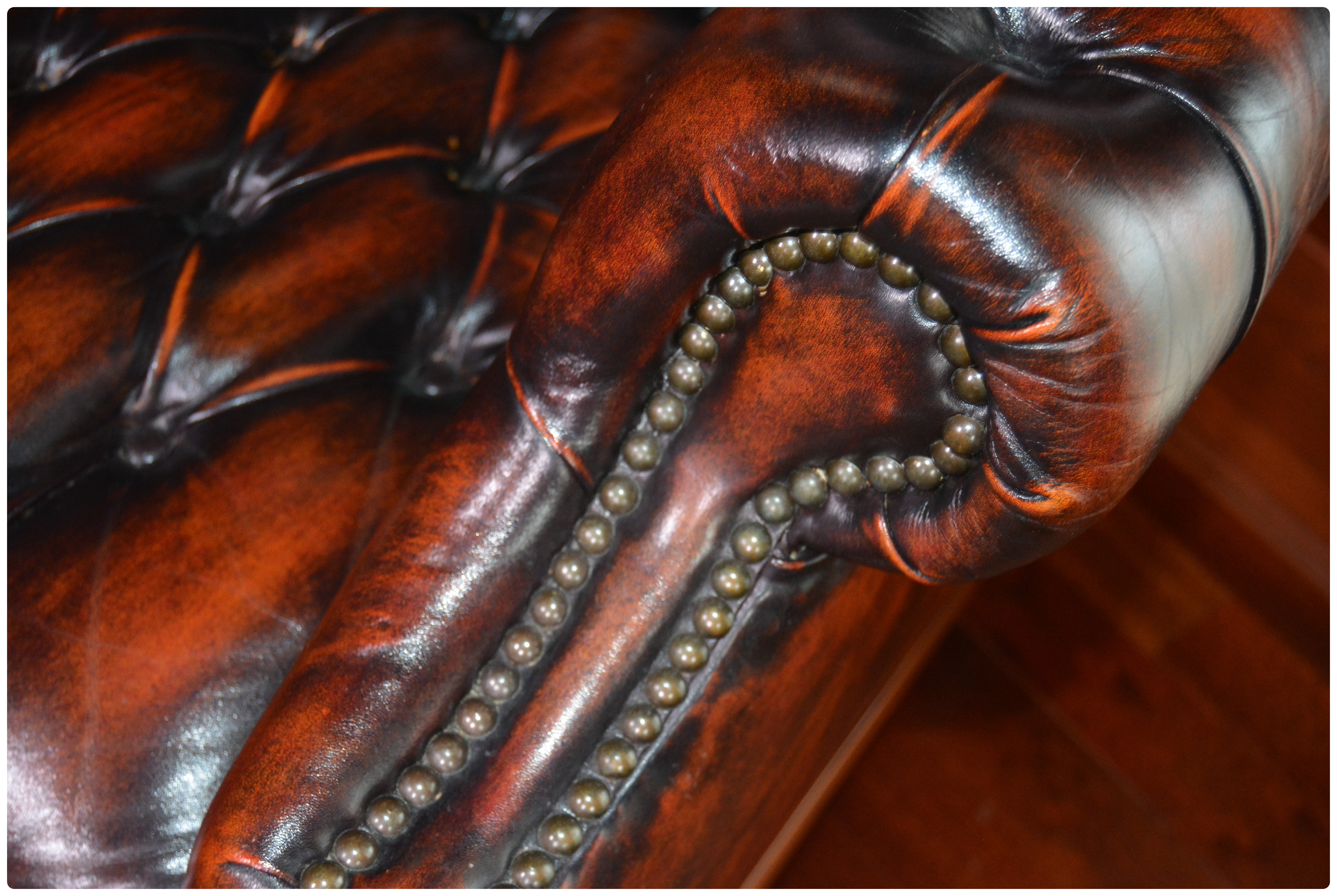 Tufted Wingback Mottled Leather Library Chair and Ottoman, Contemporary