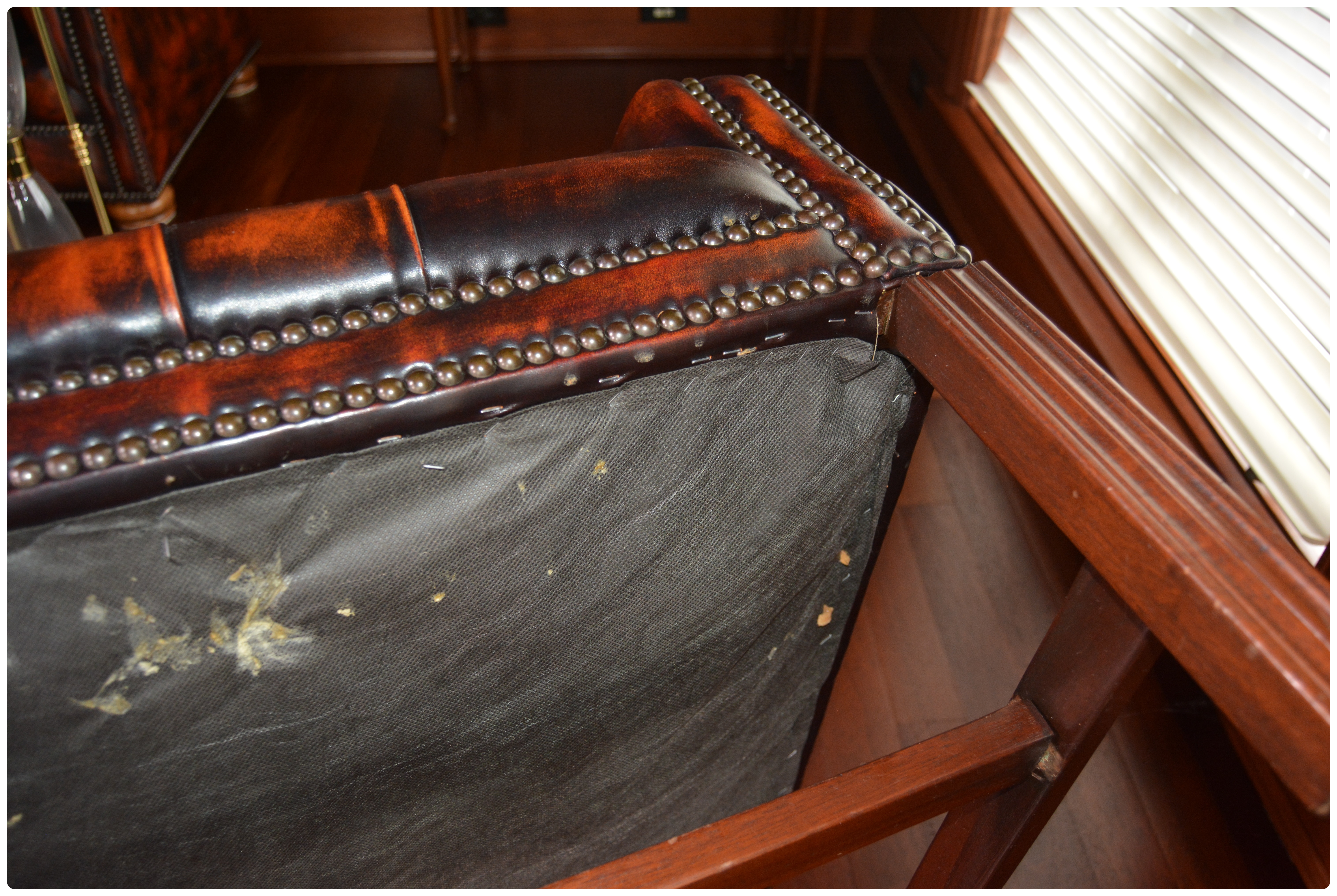 Tufted Wingback Mottled Leather Library Chair and Ottoman, Contemporary