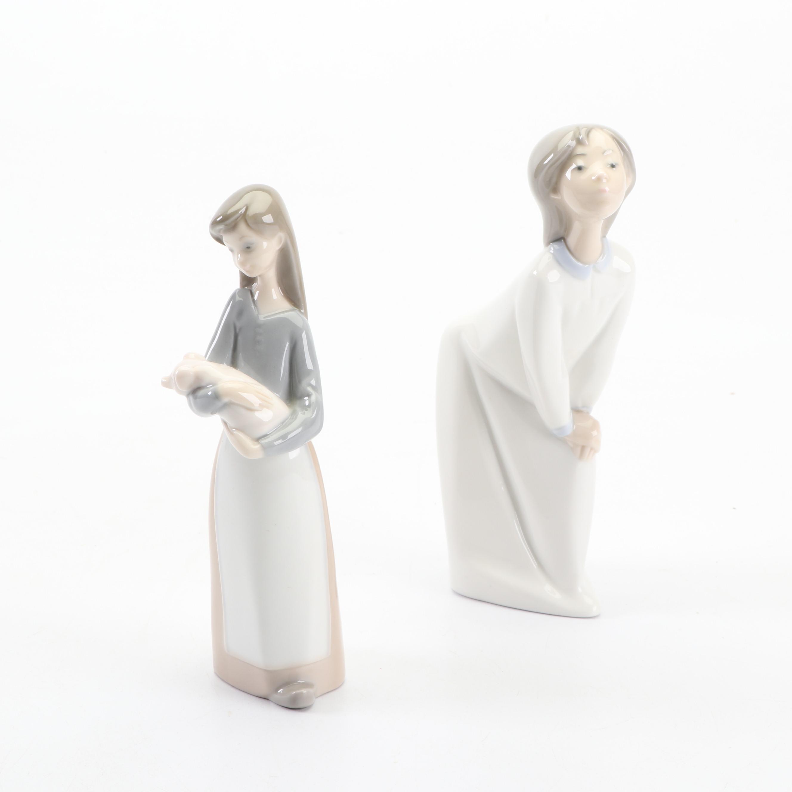 Lladró Girl Holding Piglet and Kissing Girl Figurines , 1970s