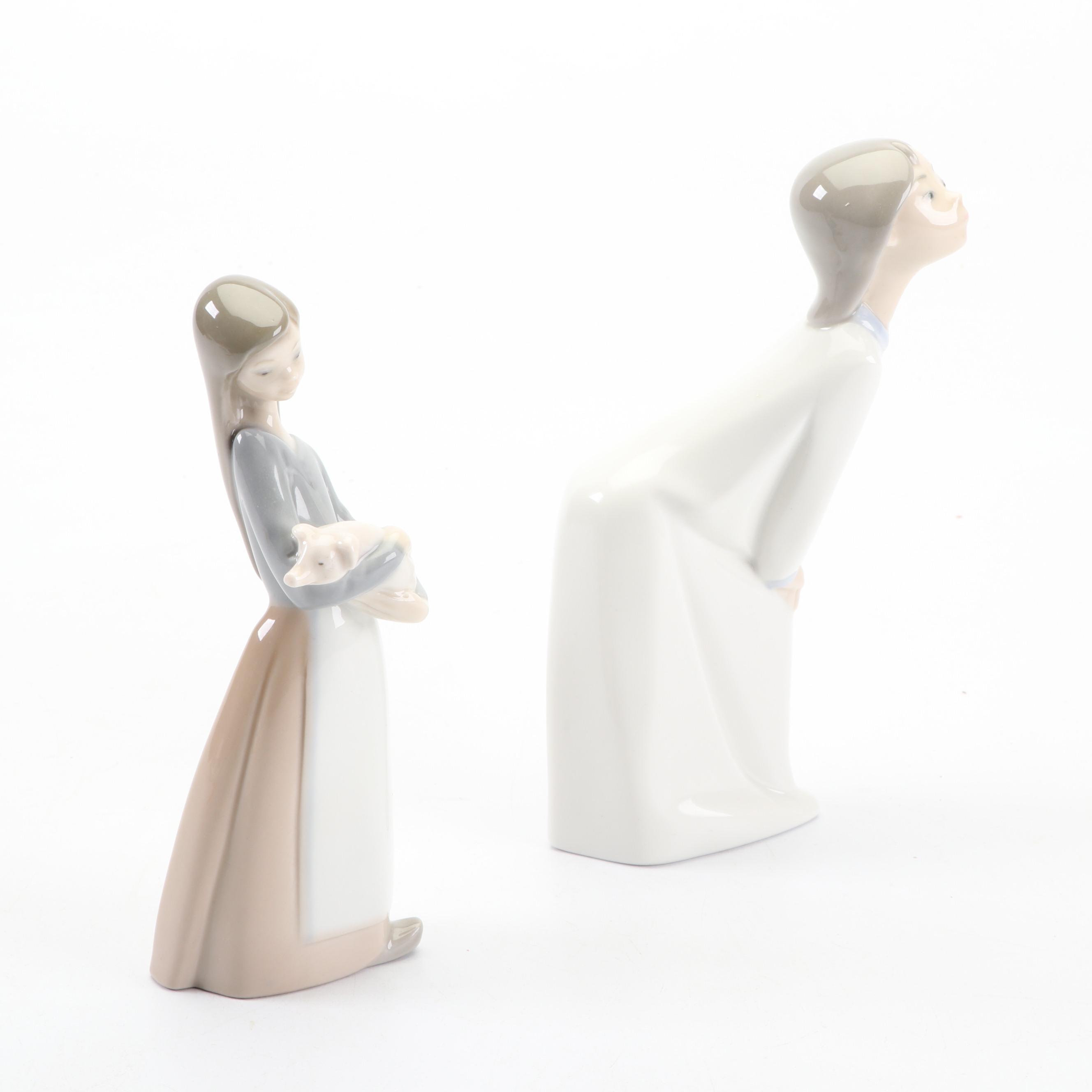 Lladró Girl Holding Piglet and Kissing Girl Figurines , 1970s