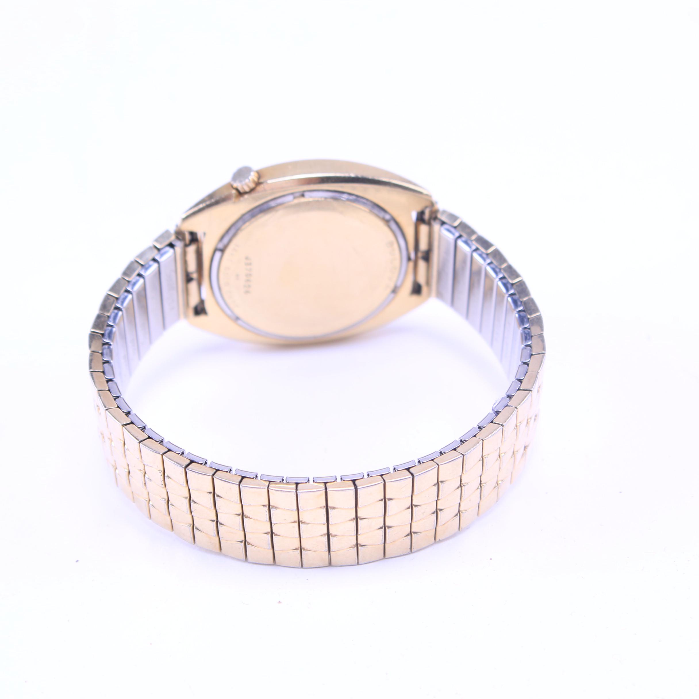 14K Yellow Gold Bulova Accutron with Gold Tone Band