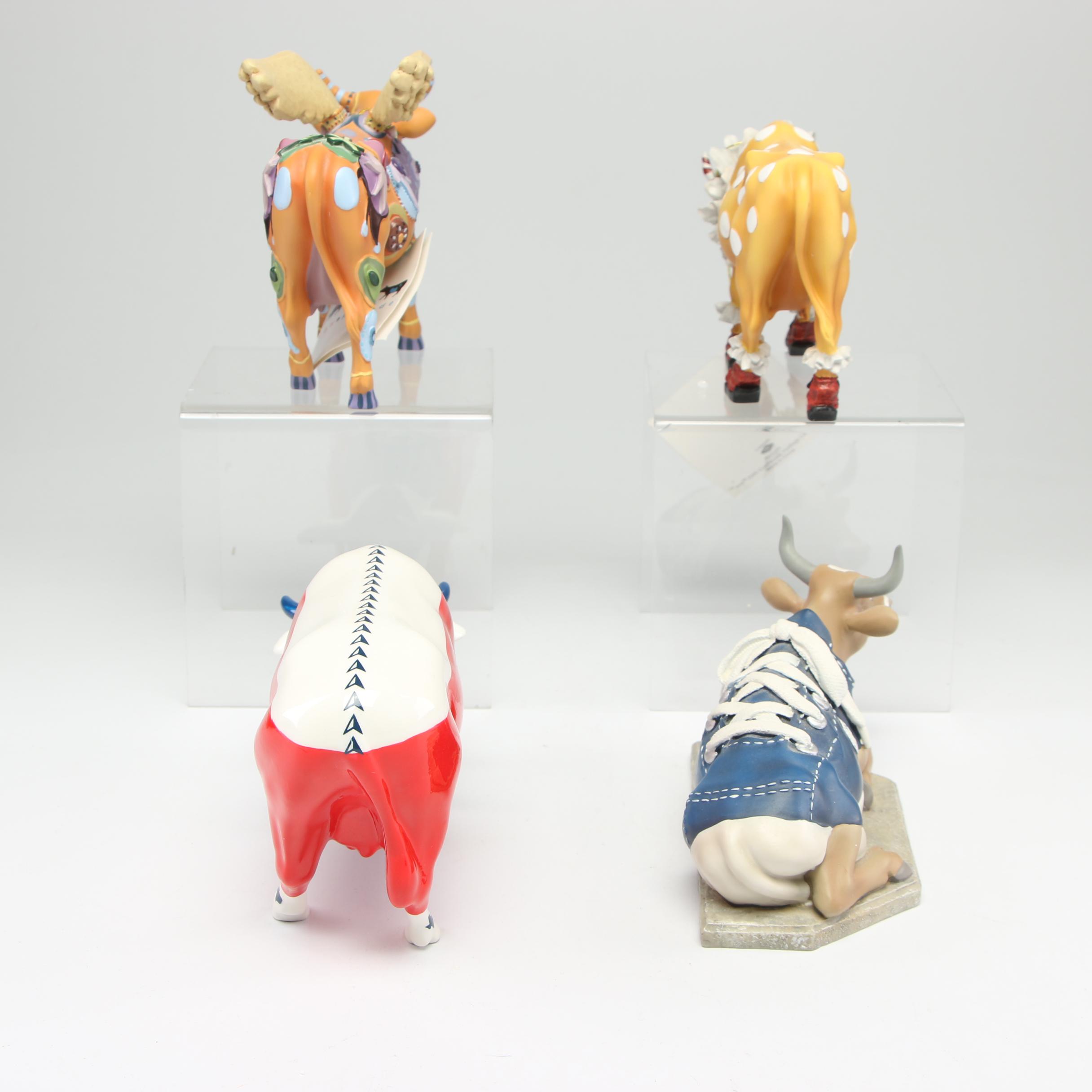 Cow Parade Figurines and Bookends Including "MooShoe" and "AngeliCow"