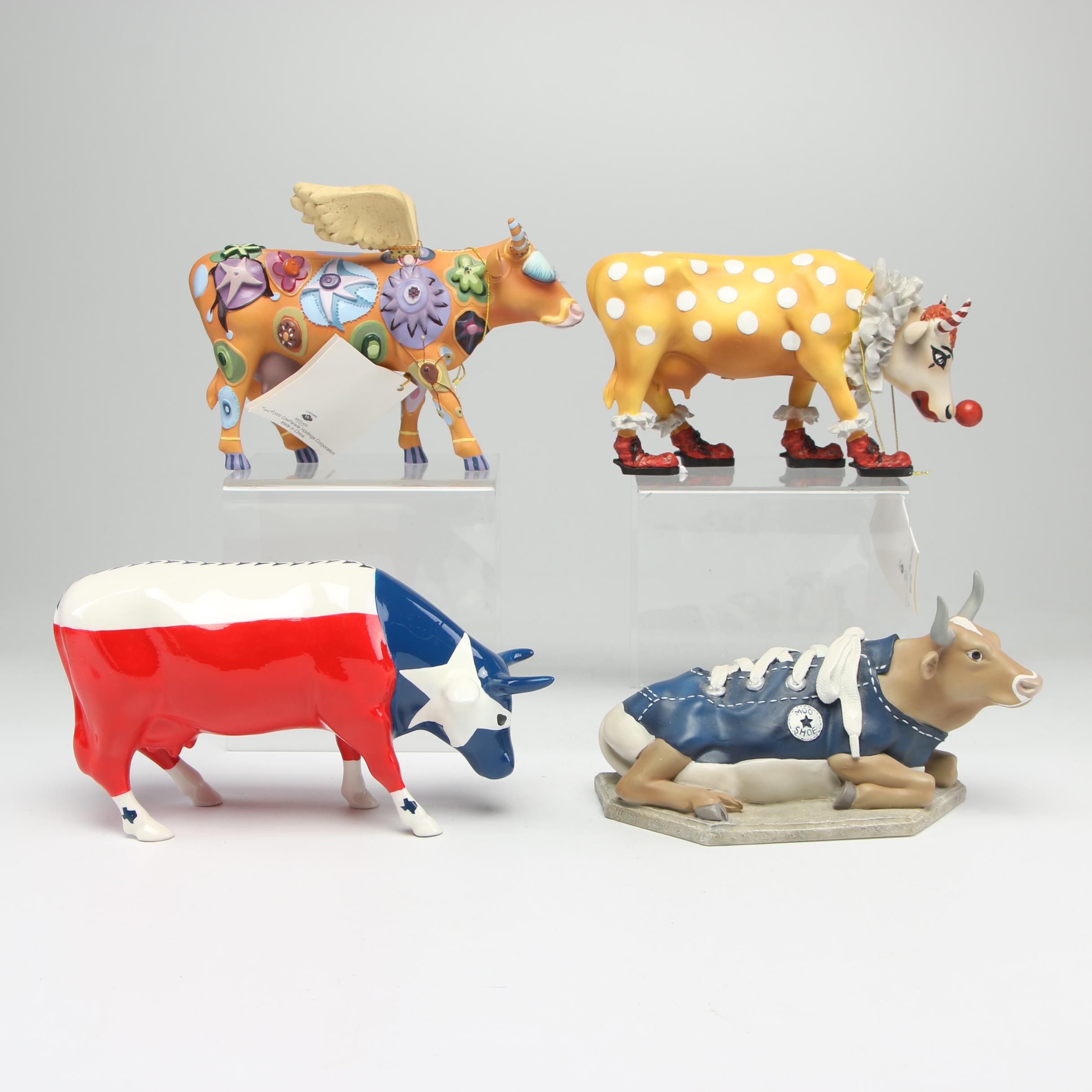 Cow Parade Figurines and Bookends Including "MooShoe" and "AngeliCow"
