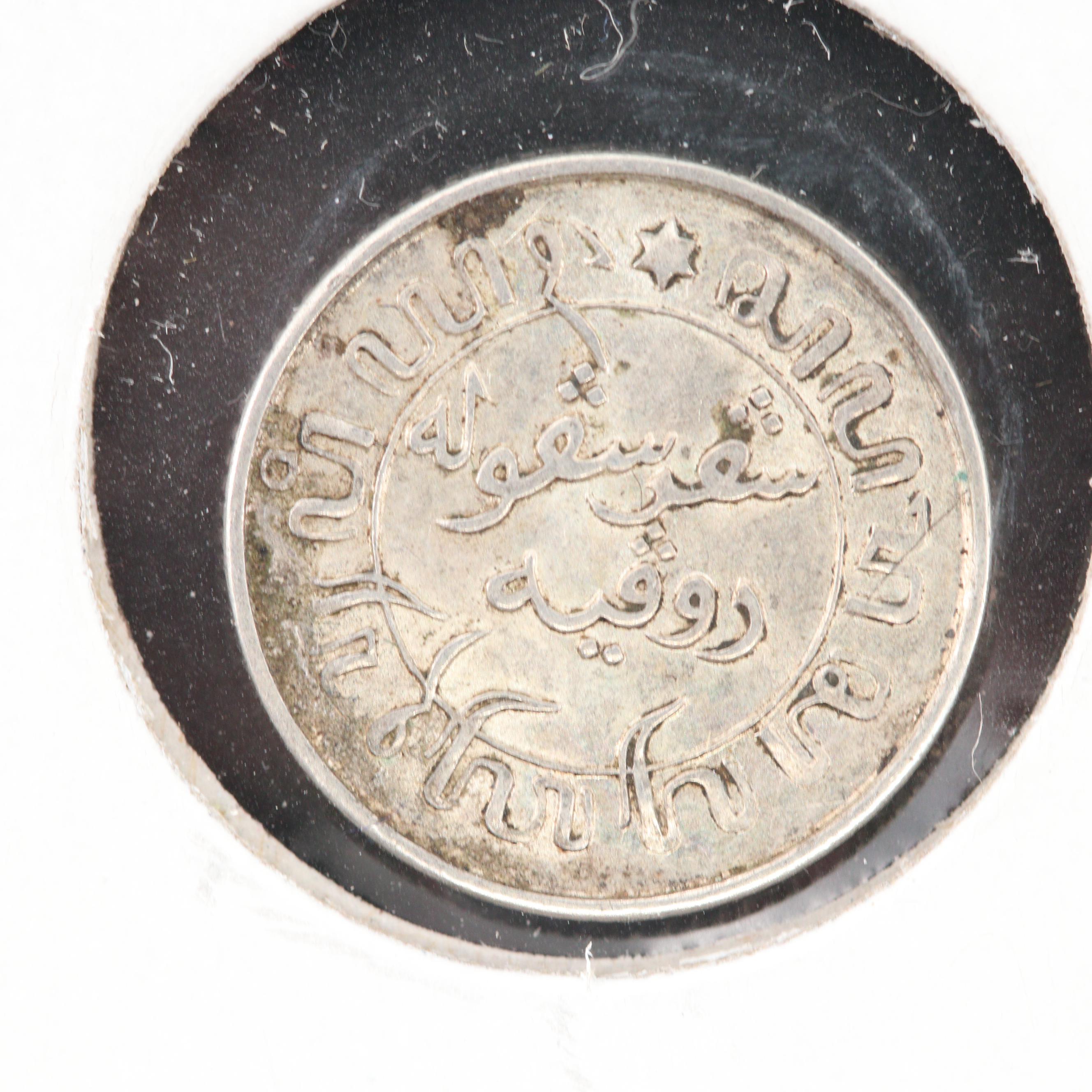 Fourteen Foreign Silver Coins