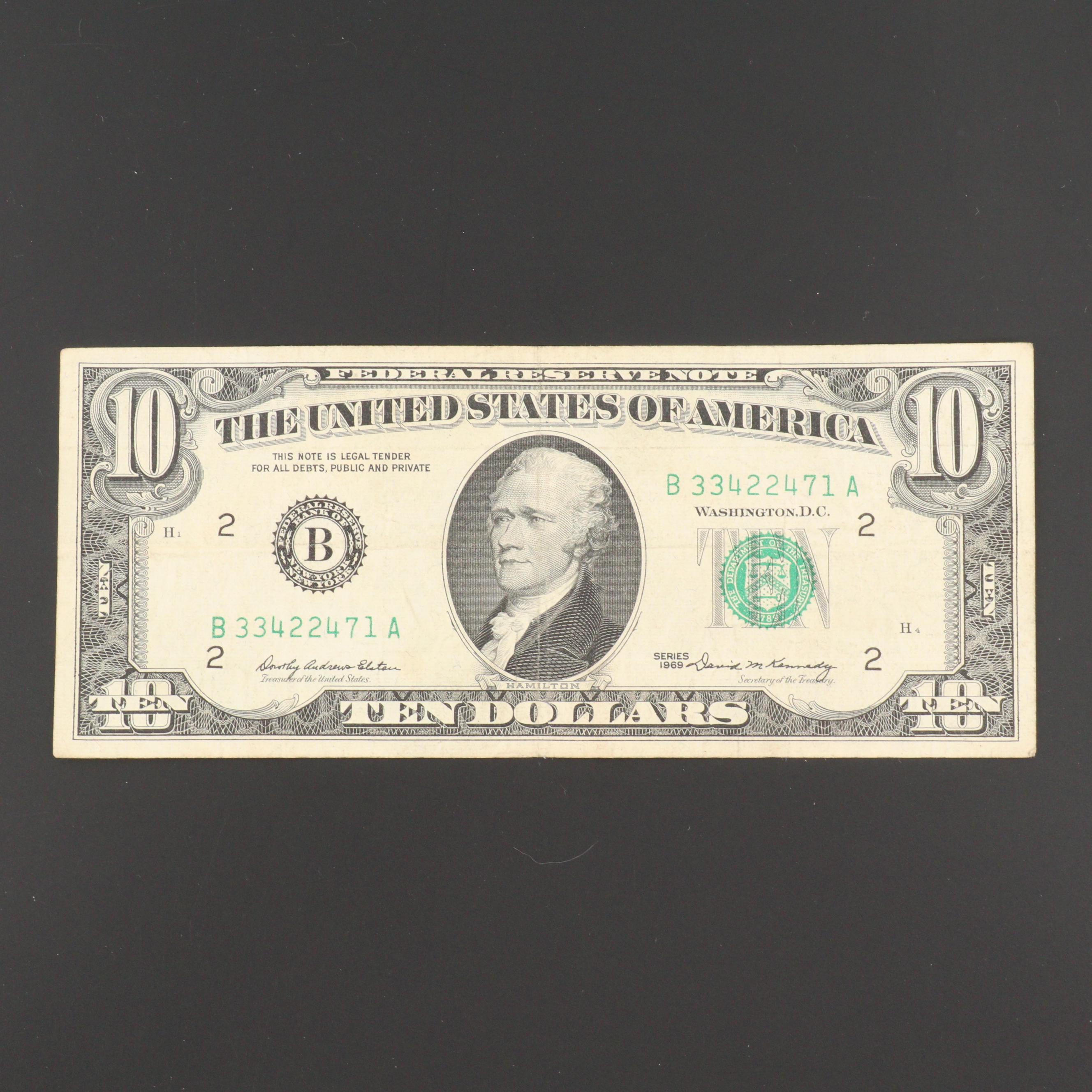 Thirty-One U.S. Coins and One U.S. Currency Note